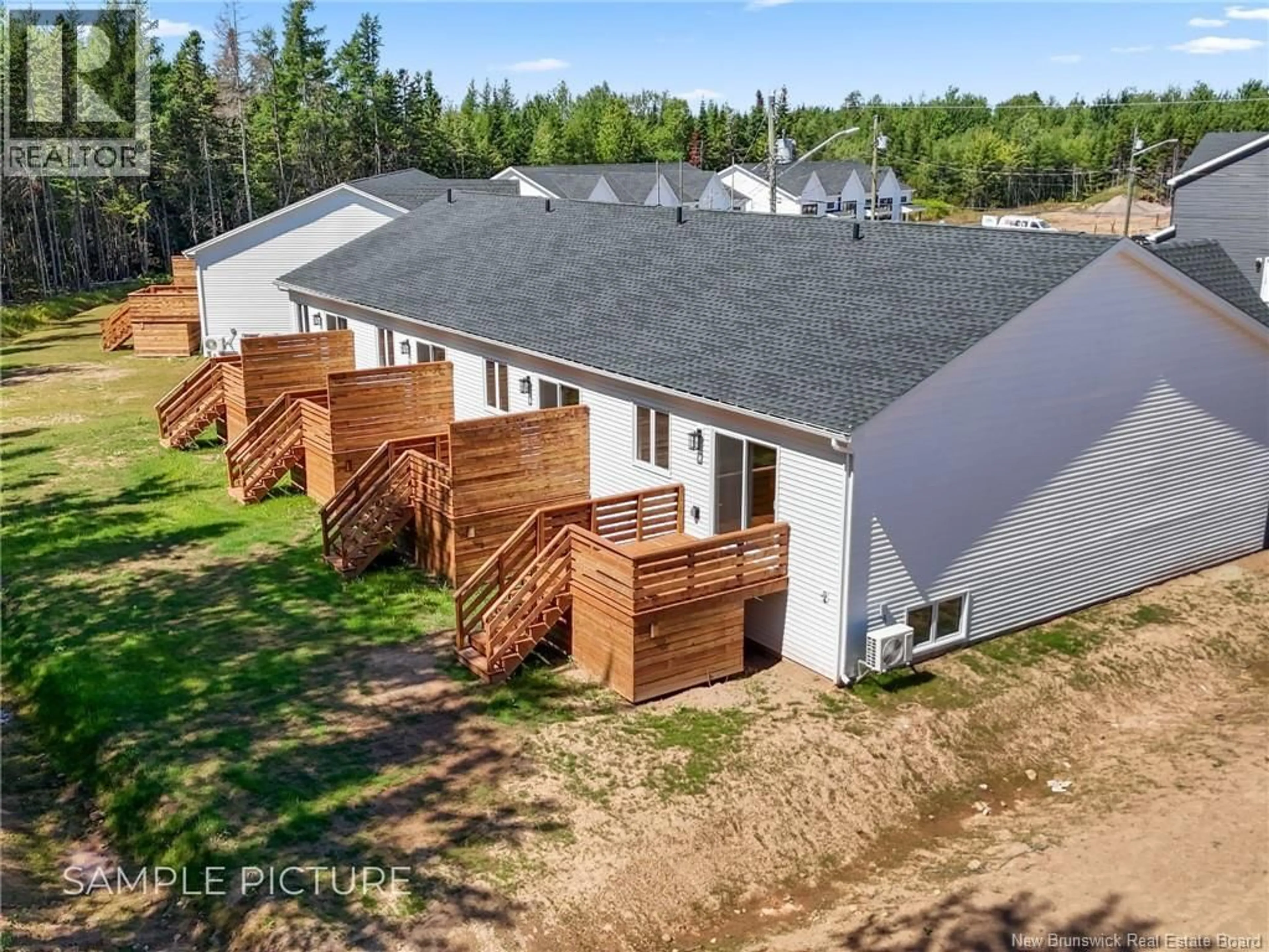 A pic from outside/outdoor area/front of a property/back of a property/a pic from drone, unknown for 108 BEAU DOMAINE STREET, Dieppe New Brunswick E1A9H5