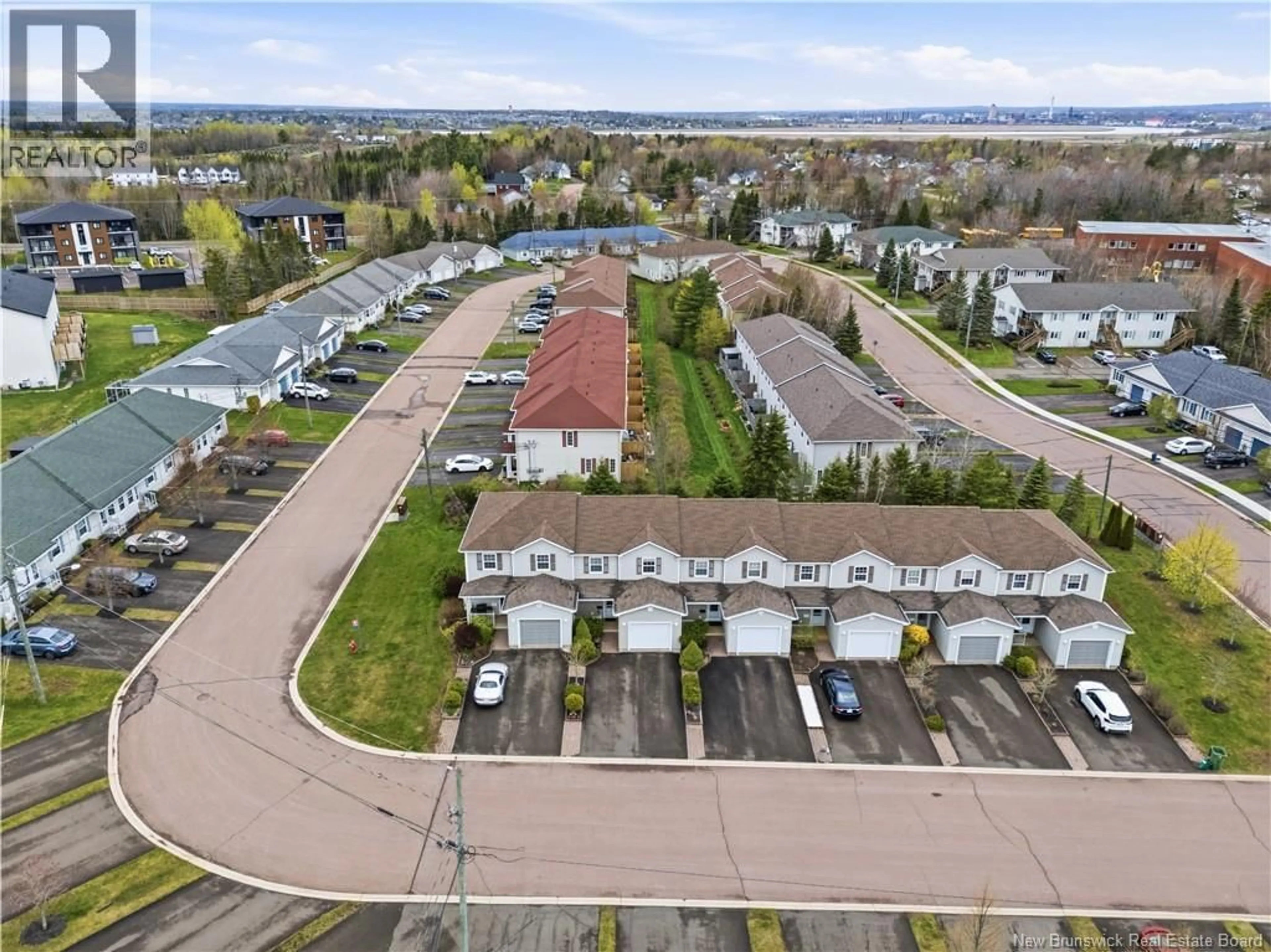 A pic from outside/outdoor area/front of a property/back of a property/a pic from drone, unknown for 98 FIRMIN CRESCENT, Dieppe New Brunswick E1A8G2