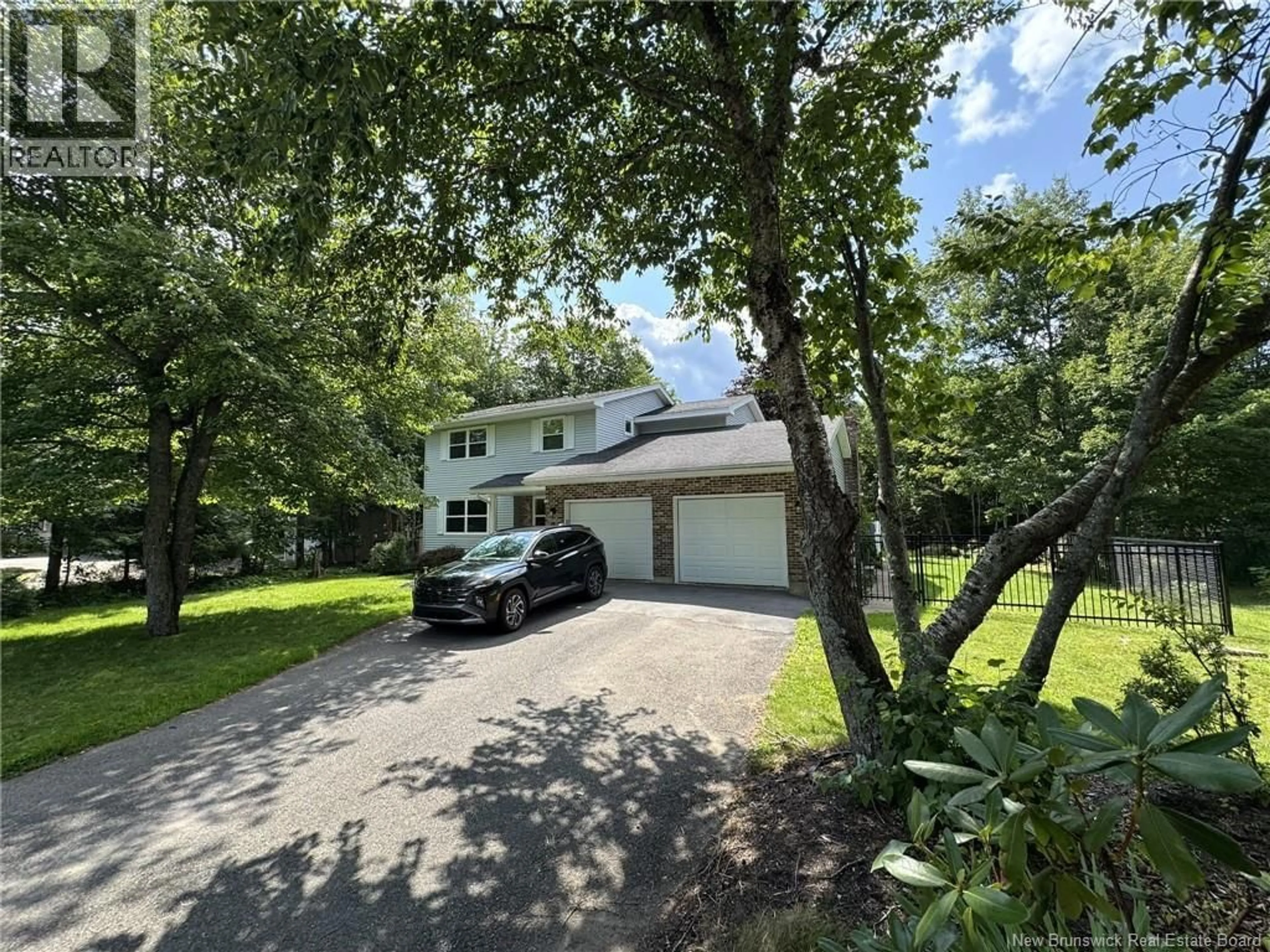 A pic from outside/outdoor area/front of a property/back of a property/a pic from drone, unknown for 2 CORAL LANE, Rothesay New Brunswick E2E4X6