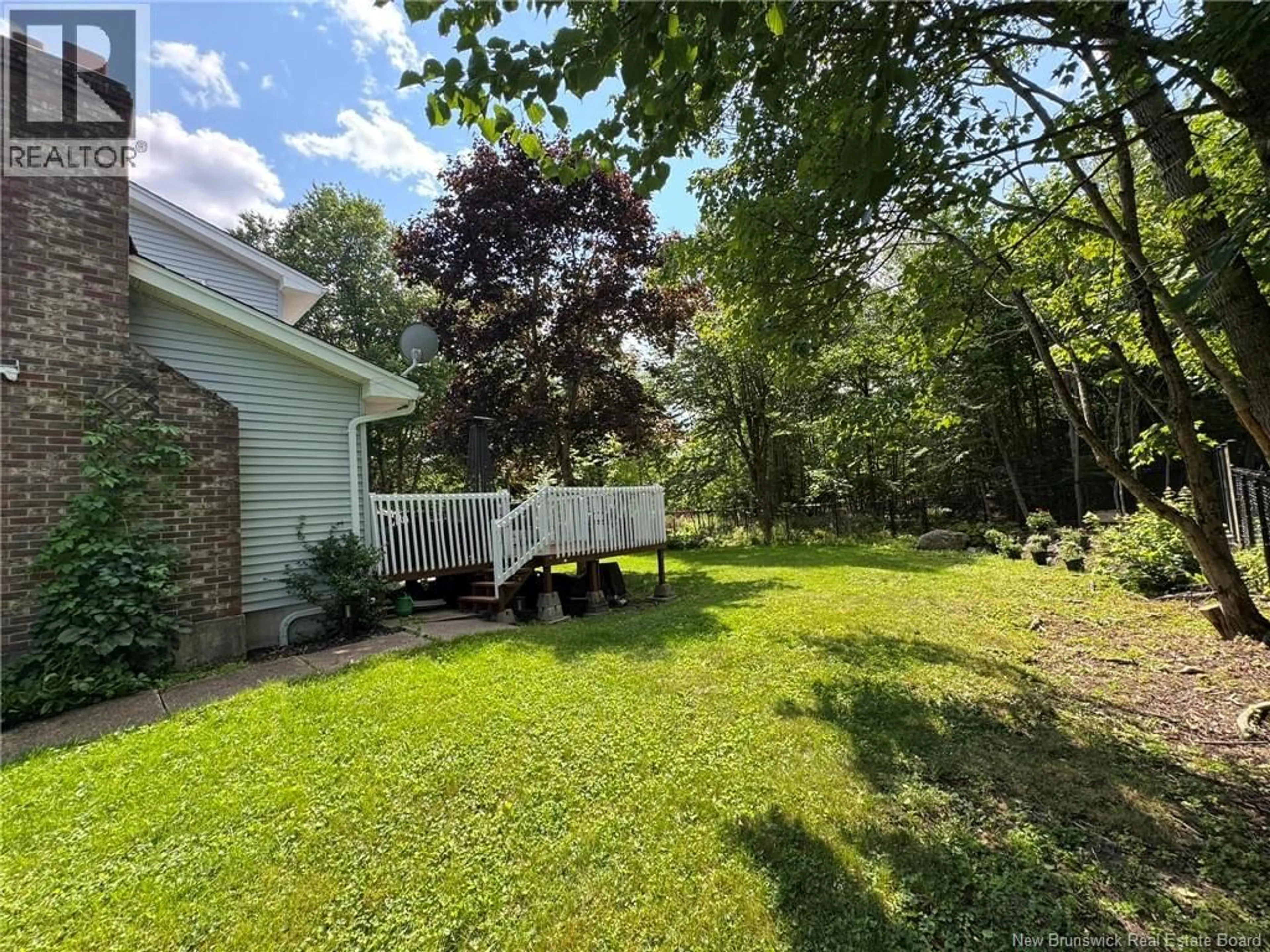 A pic from outside/outdoor area/front of a property/back of a property/a pic from drone, forest/trees view for 2 CORAL LANE, Rothesay New Brunswick E2E4X6