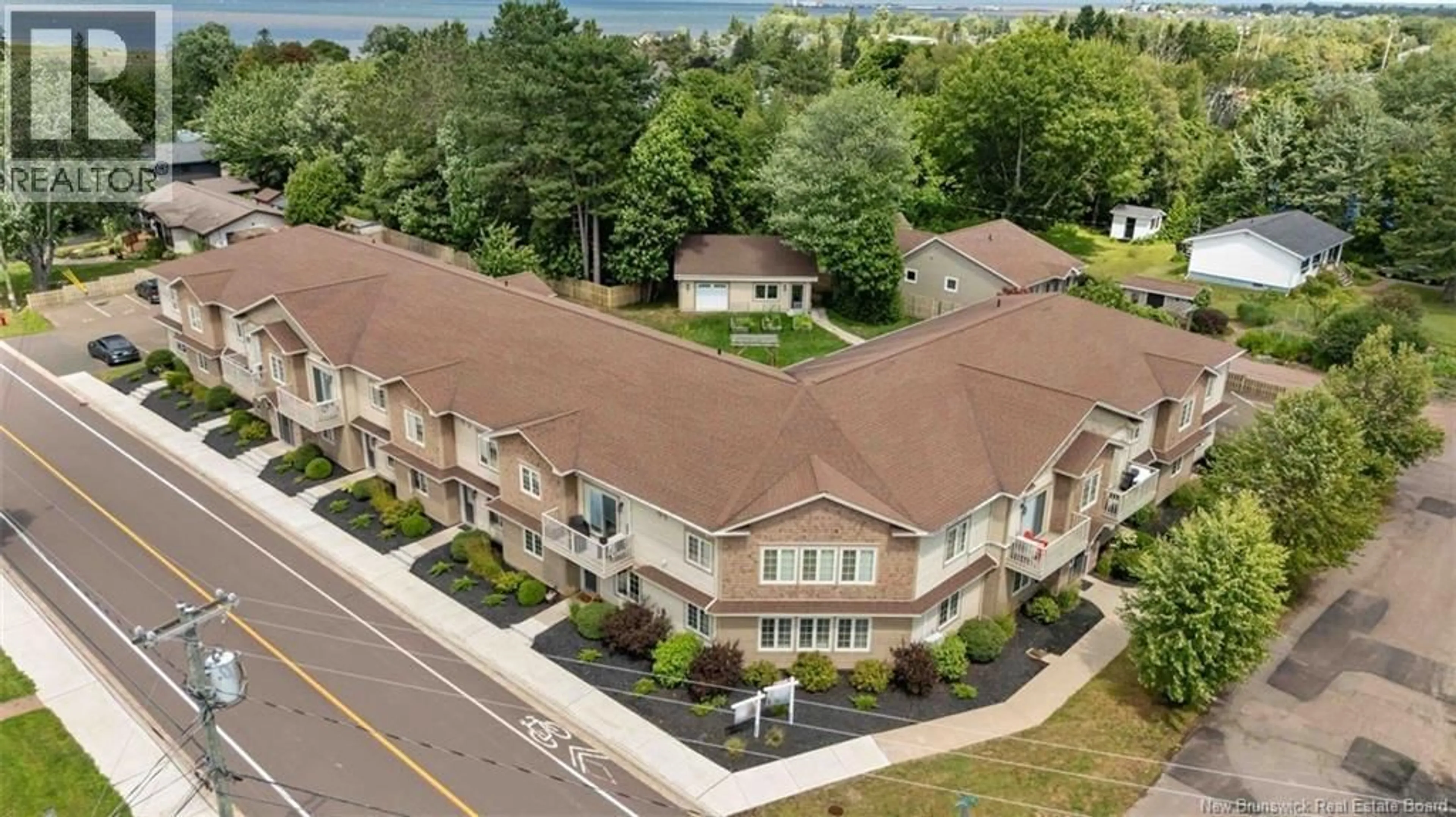 A pic from outside/outdoor area/front of a property/back of a property/a pic from drone, unknown for 105 - 98 PLEASANT STREET, Shediac New Brunswick E4P2L6