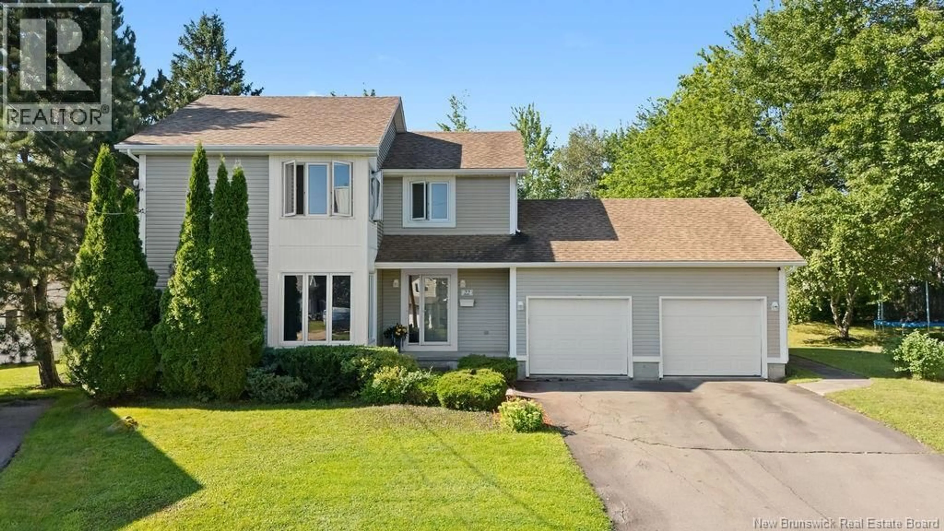 Home with vinyl exterior material, street for 22 CHIASSON COURT, Dieppe New Brunswick E1A6J4