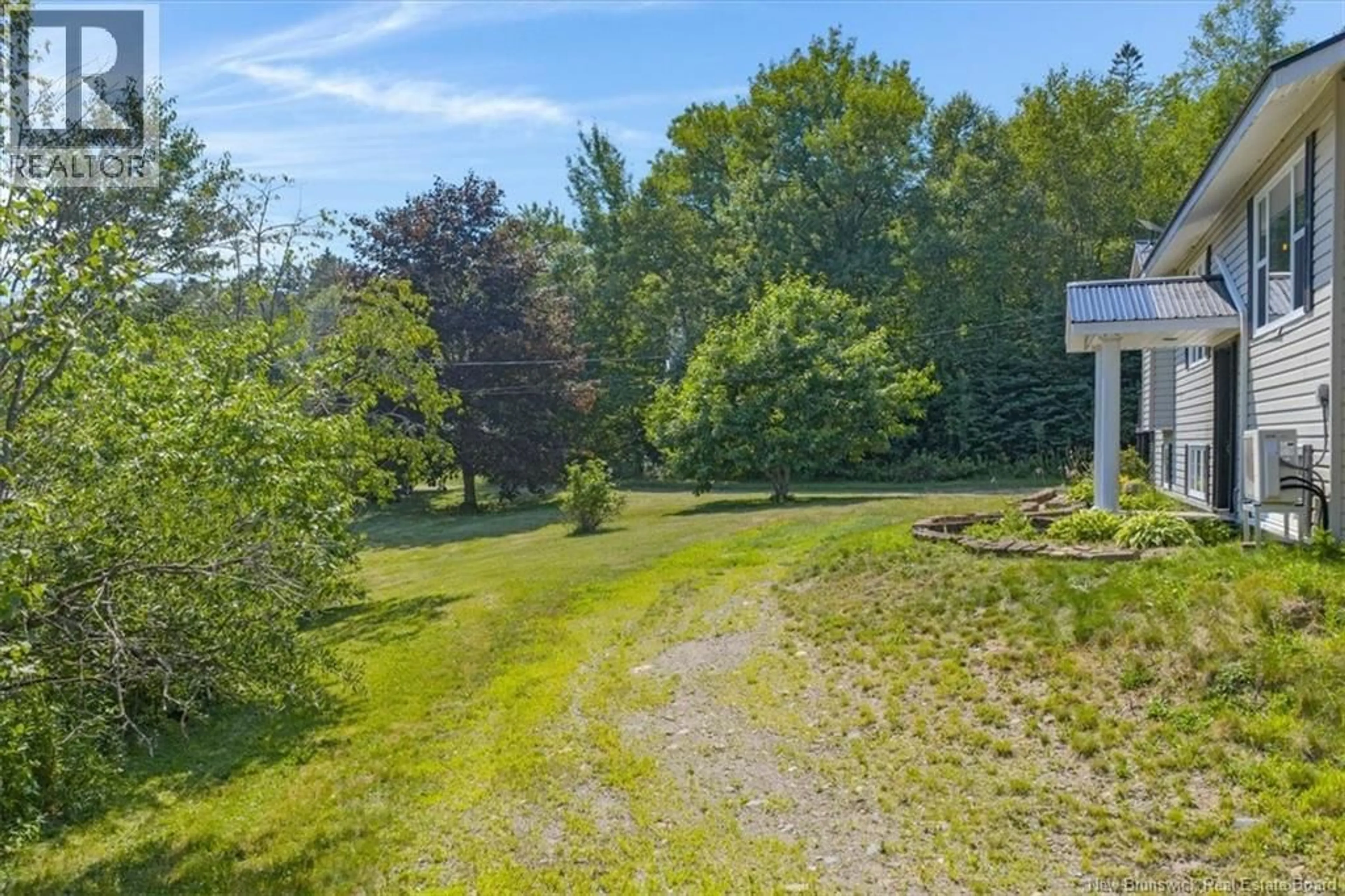 A pic from outside/outdoor area/front of a property/back of a property/a pic from drone, forest/trees view for 933 ROUTE 770, Bonny River New Brunswick E5C1C5