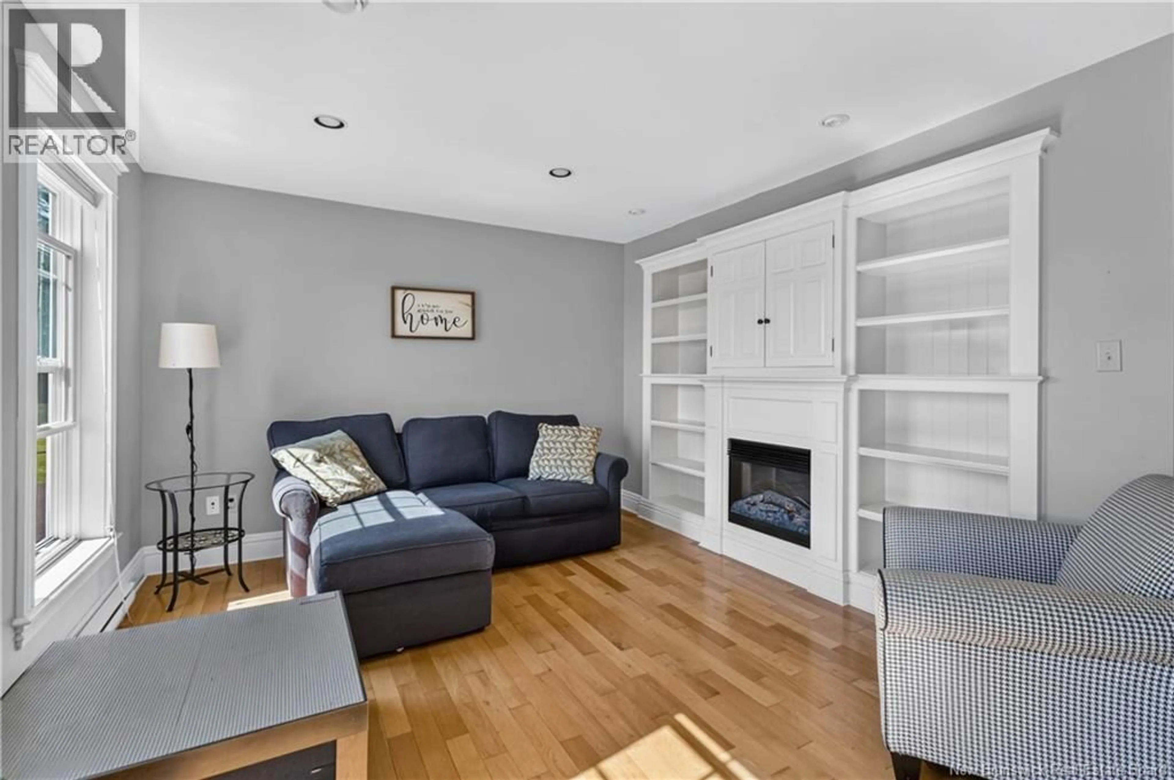 Living room with furniture, wood/laminate floor for 60 LOWER MOUNTAIN ROAD, Boundary Creek New Brunswick E1G4W1