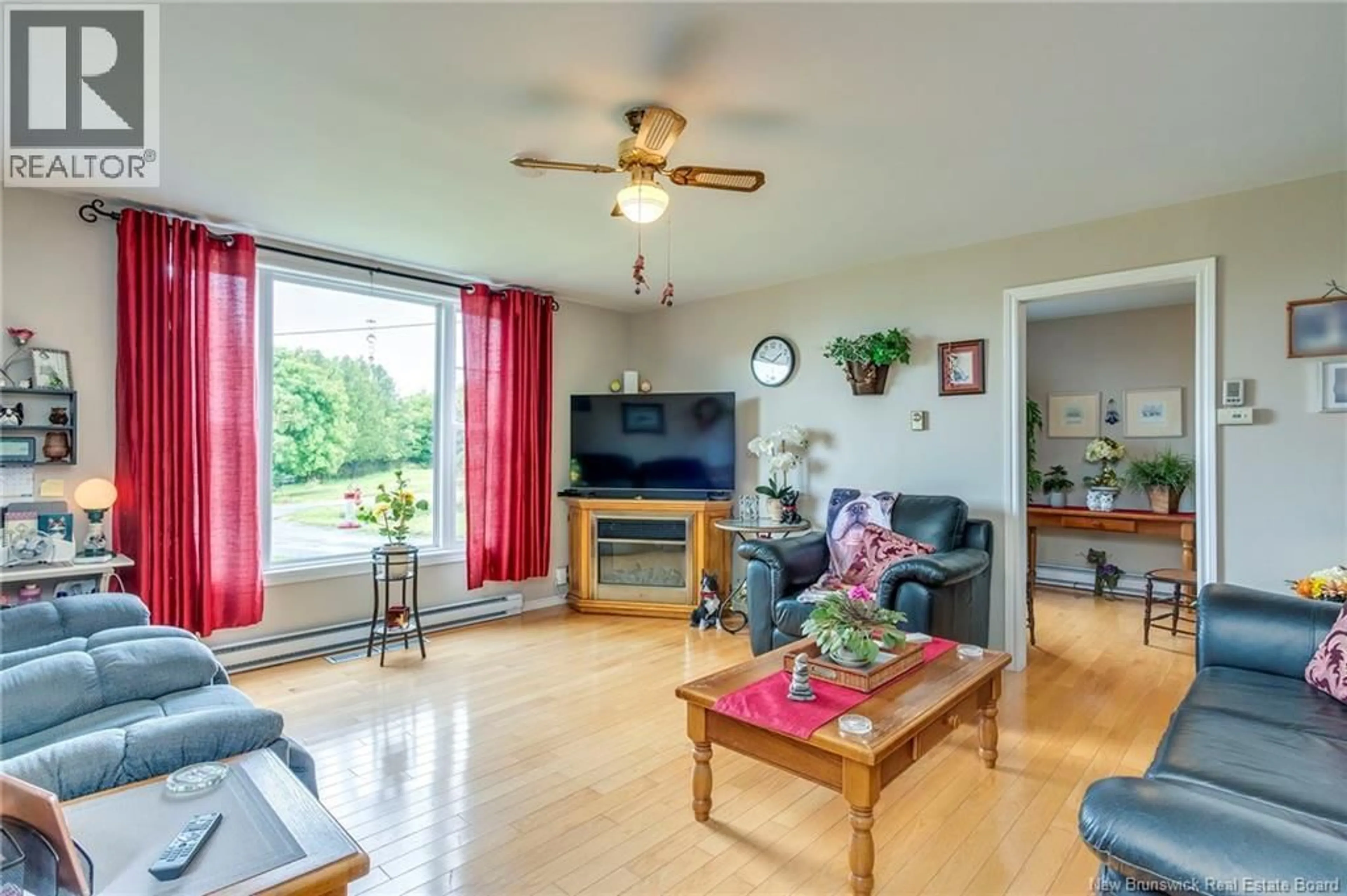 Living room with furniture, wood/laminate floor for 80 GARNETT ROAD, Saint John New Brunswick E2J3C3