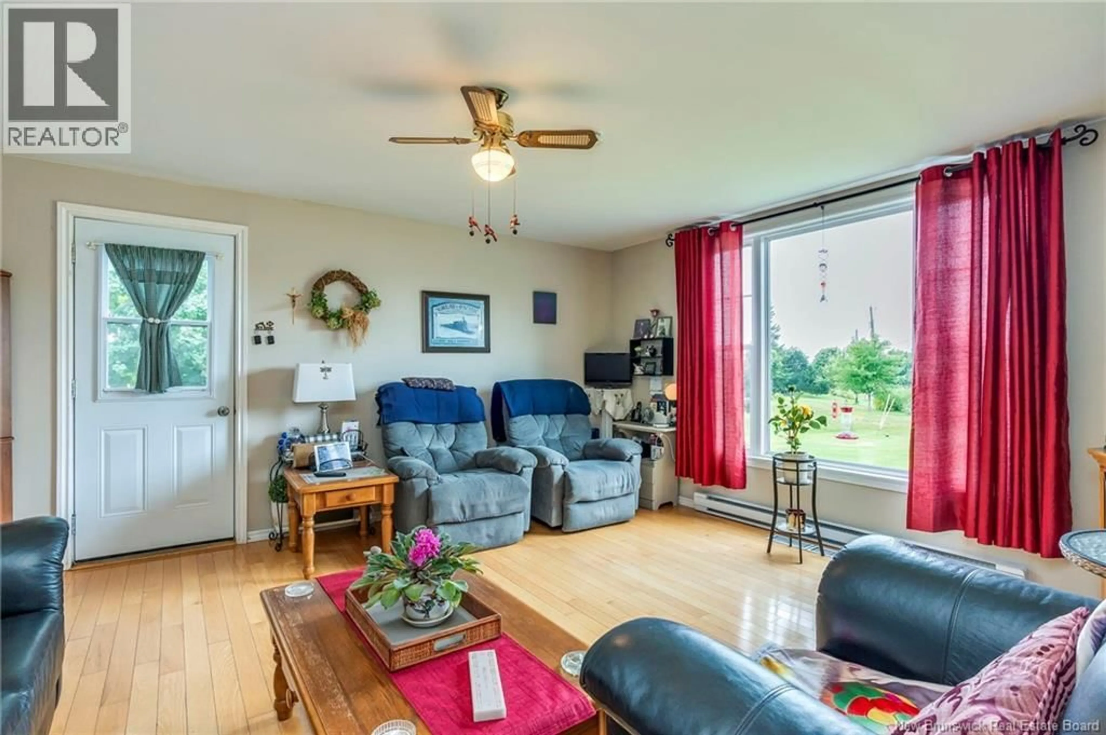 Living room with furniture, wood/laminate floor for 80 GARNETT ROAD, Saint John New Brunswick E2J3C3