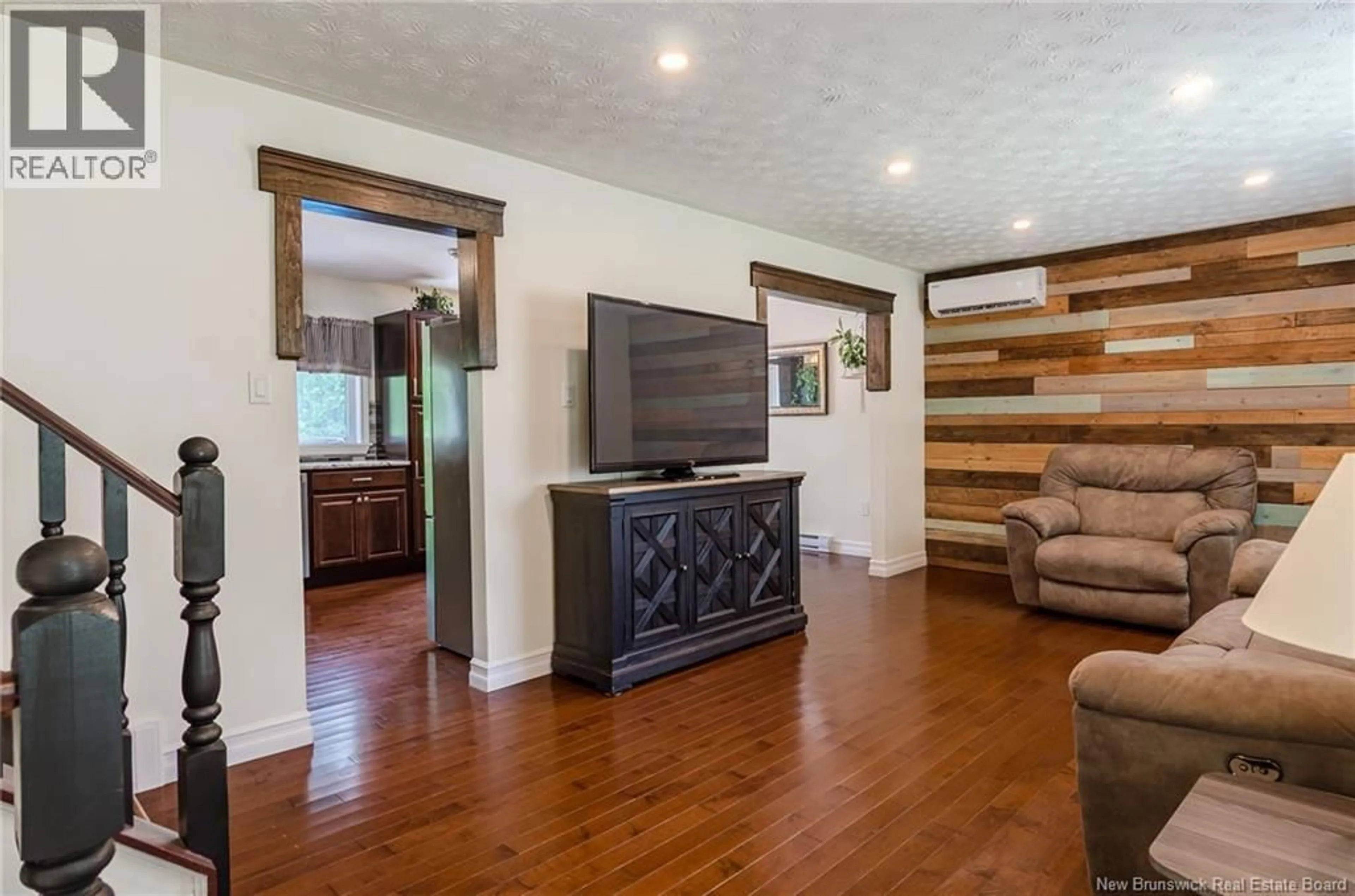 Living room with furniture, wood/laminate floor for 44 WEDGEWOOD DRIVE, Rothesay New Brunswick E2E3P8