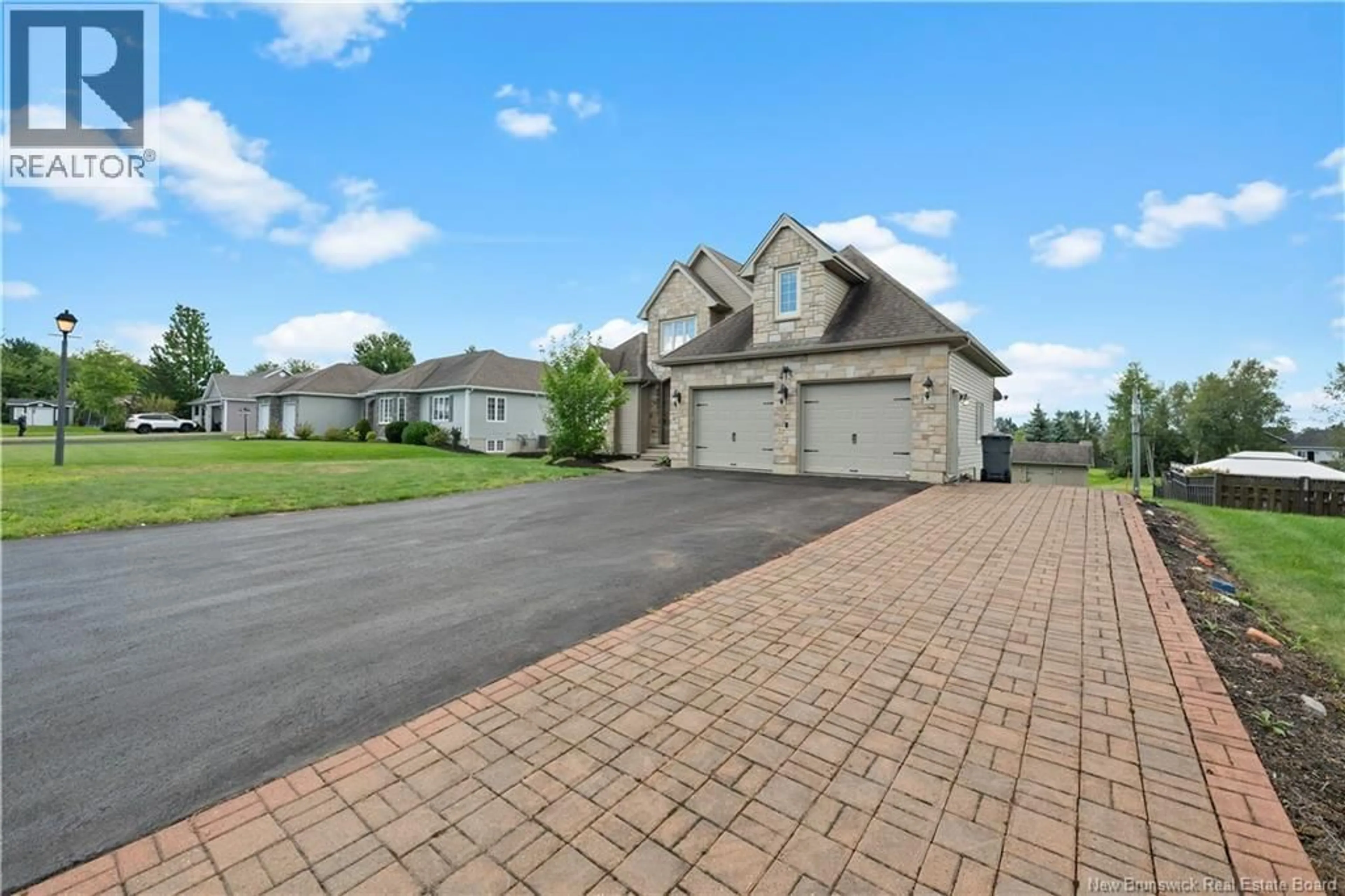 A pic from outside/outdoor area/front of a property/back of a property/a pic from drone, street for 415 GRANDE-VALLEE COURT, Dieppe New Brunswick E1A8S1