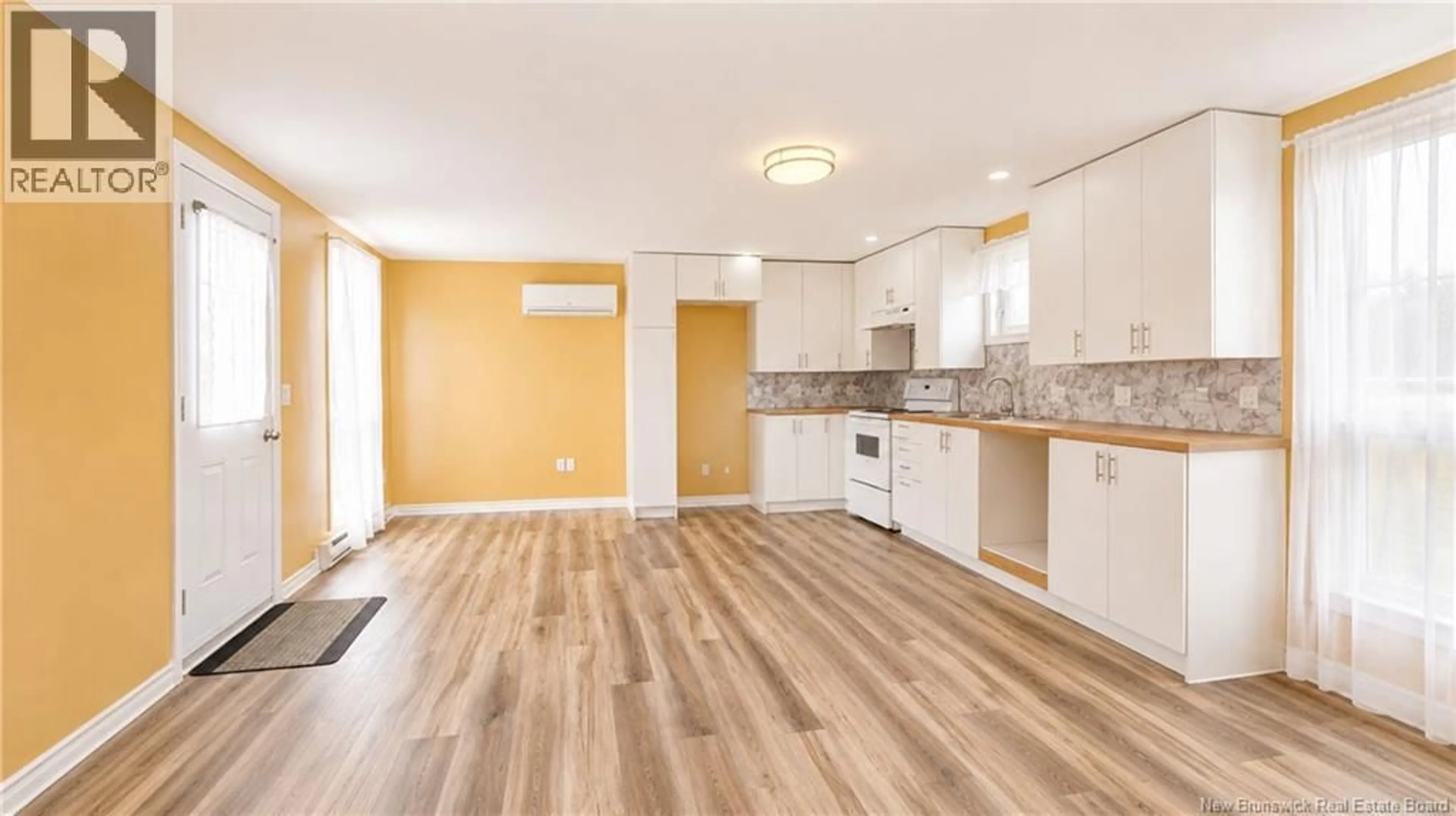 Open concept kitchen, wood/laminate floor for 816 BASQUE RUE, Canton Des Basques New Brunswick E1X3P2
