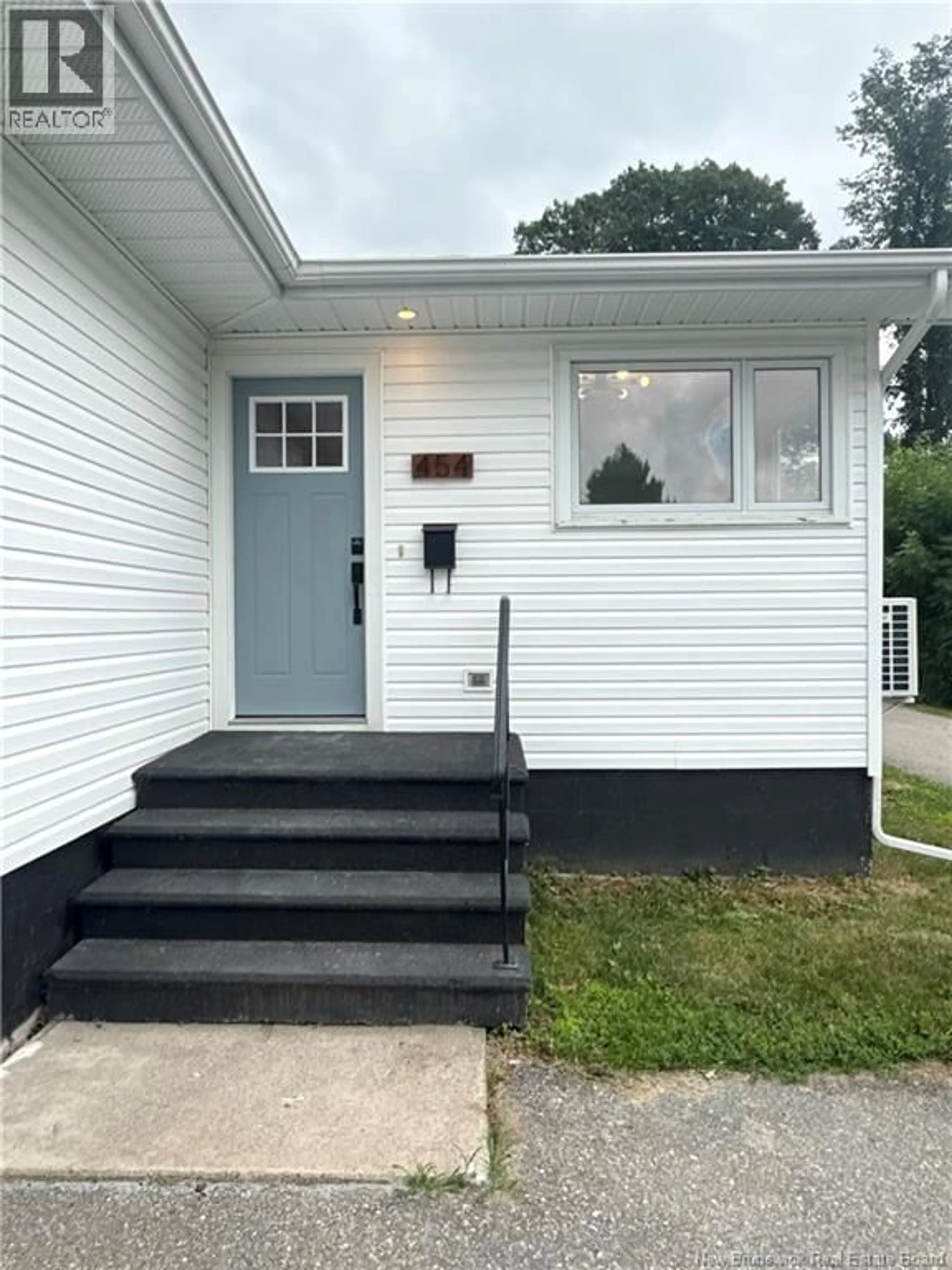 Home with vinyl exterior material, street for 454 GREMLEY DRIVE, Miramichi New Brunswick E1V2M1