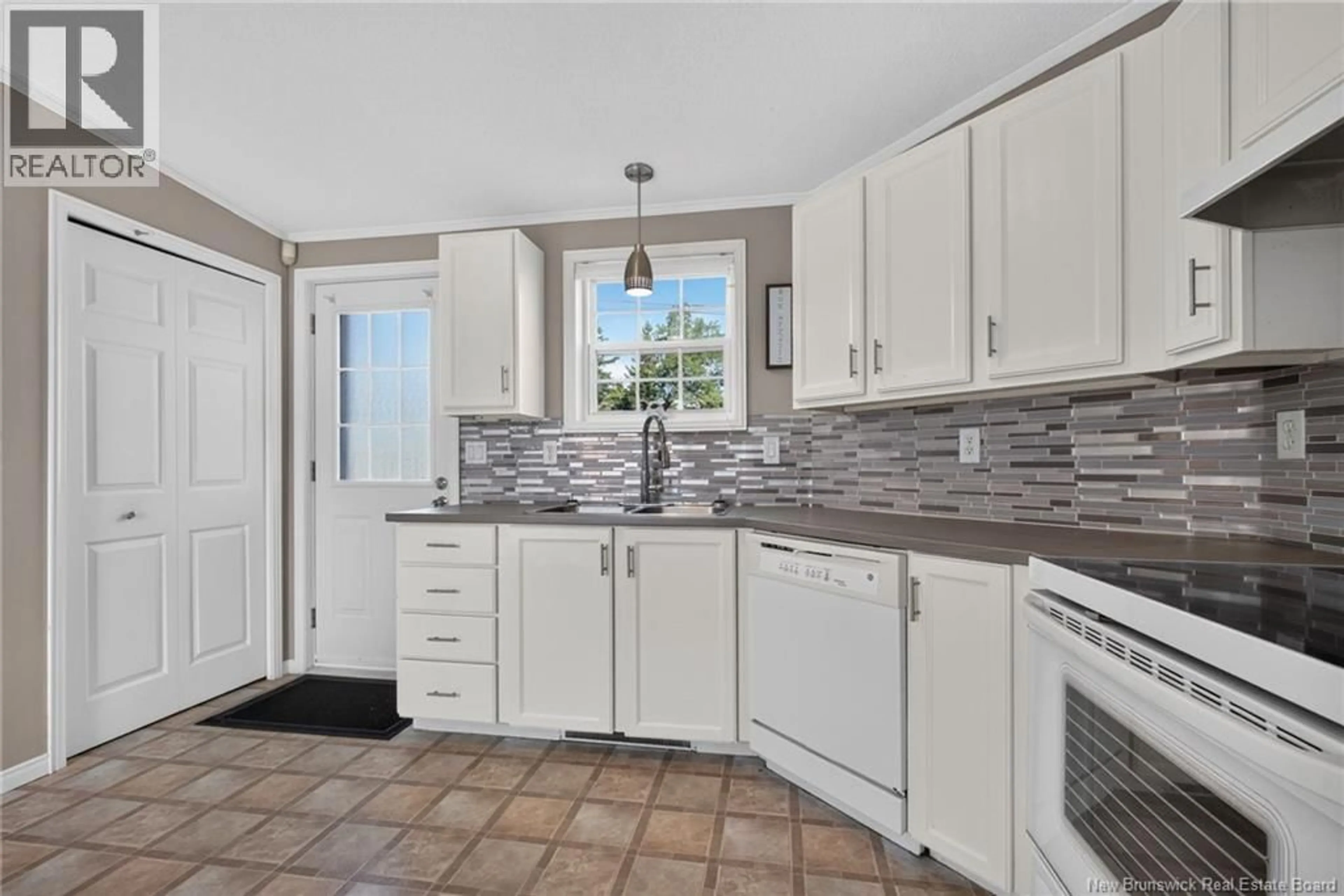 Open concept kitchen, ceramic/tile floor for 101 NEPISIGUIT, Dieppe New Brunswick E1A7N1
