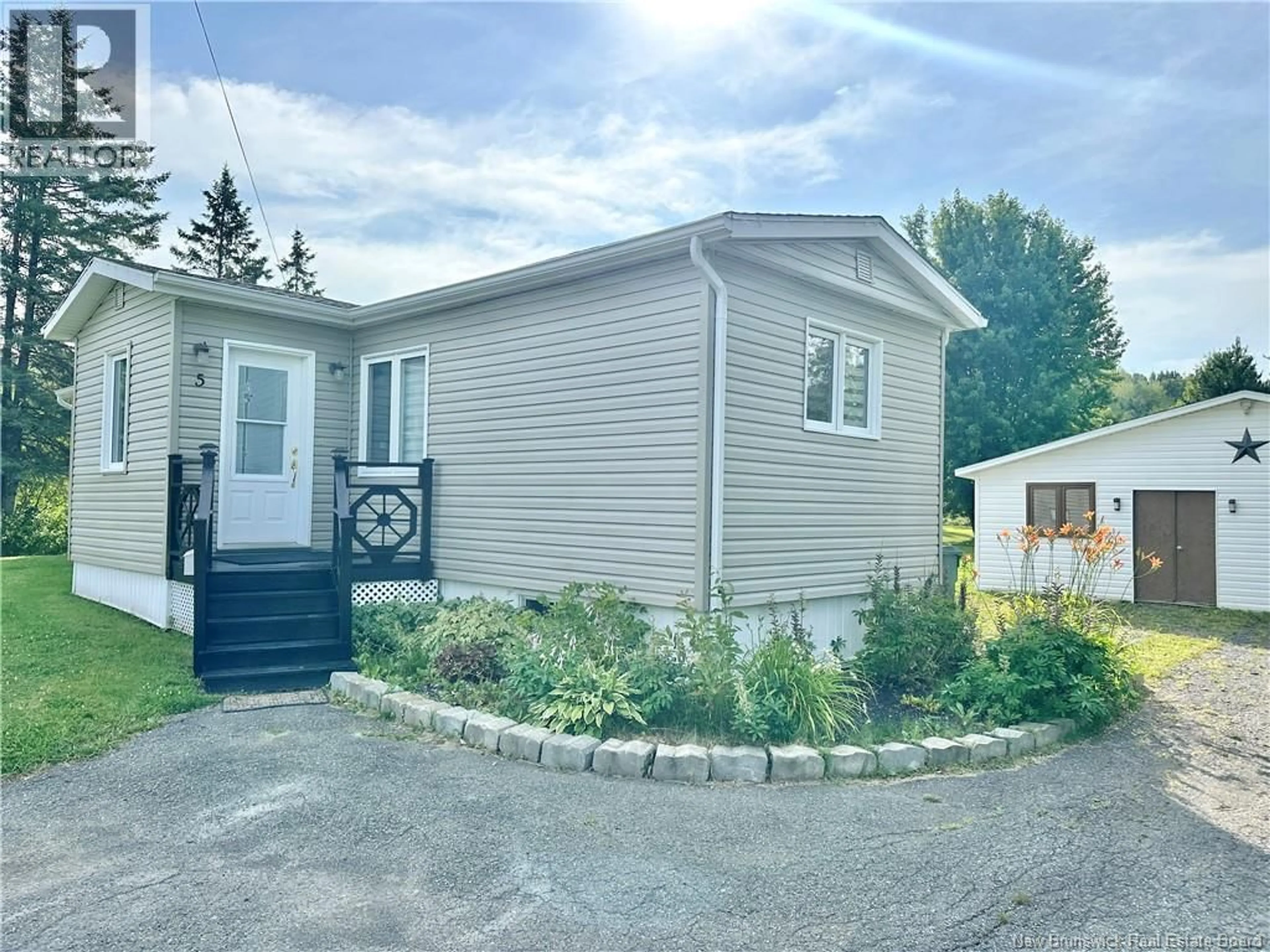 Home with vinyl exterior material, street for 5 PHILIBERT STREET, Edmundston New Brunswick E3V3V3
