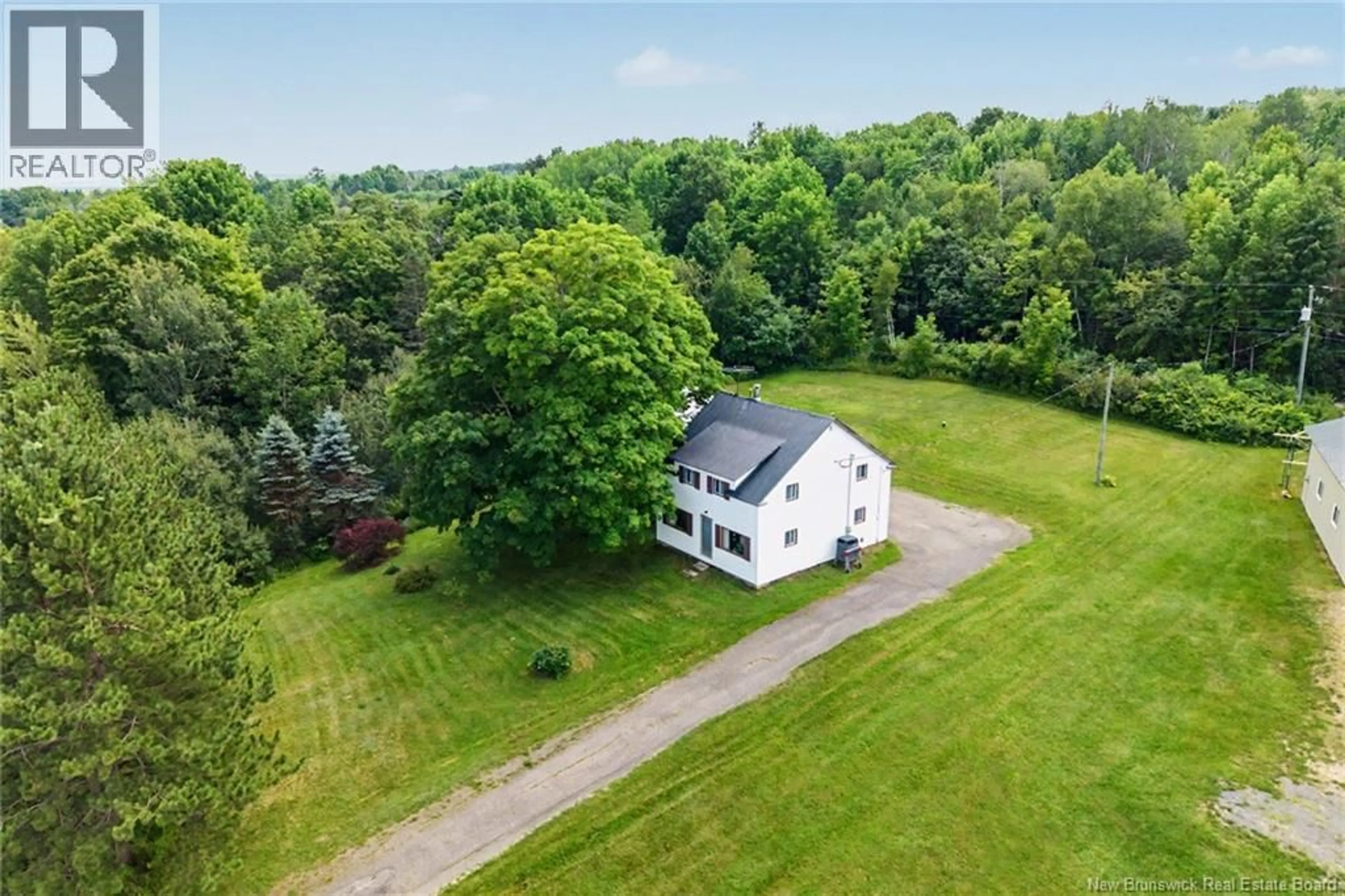 A pic from outside/outdoor area/front of a property/back of a property/a pic from drone, unknown for 7304 RTE 102, Dumfries New Brunswick E6G1P8