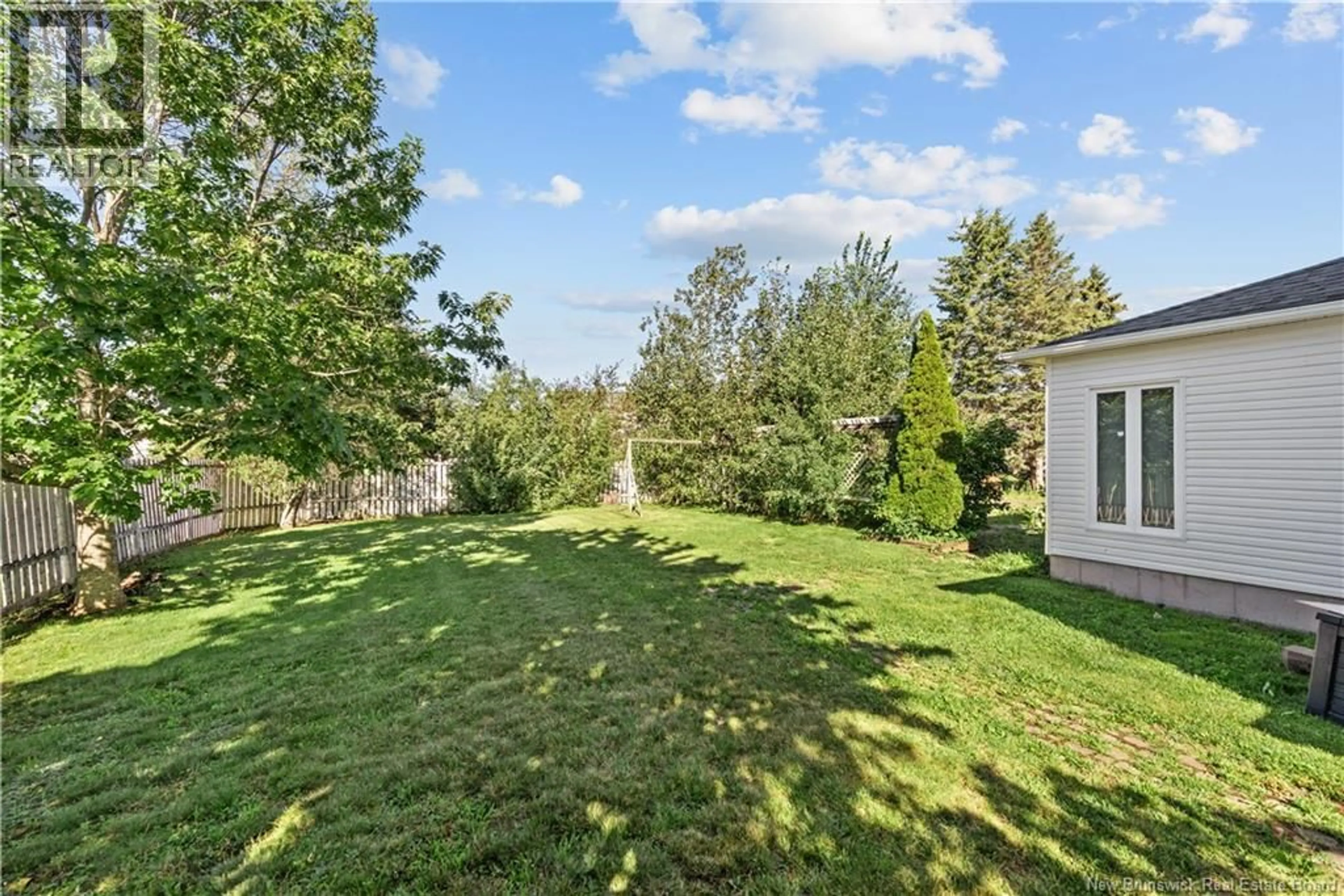 A pic from outside/outdoor area/front of a property/back of a property/a pic from drone, forest/trees view for 315 BELLIVEAU, Dieppe New Brunswick E1A6T5