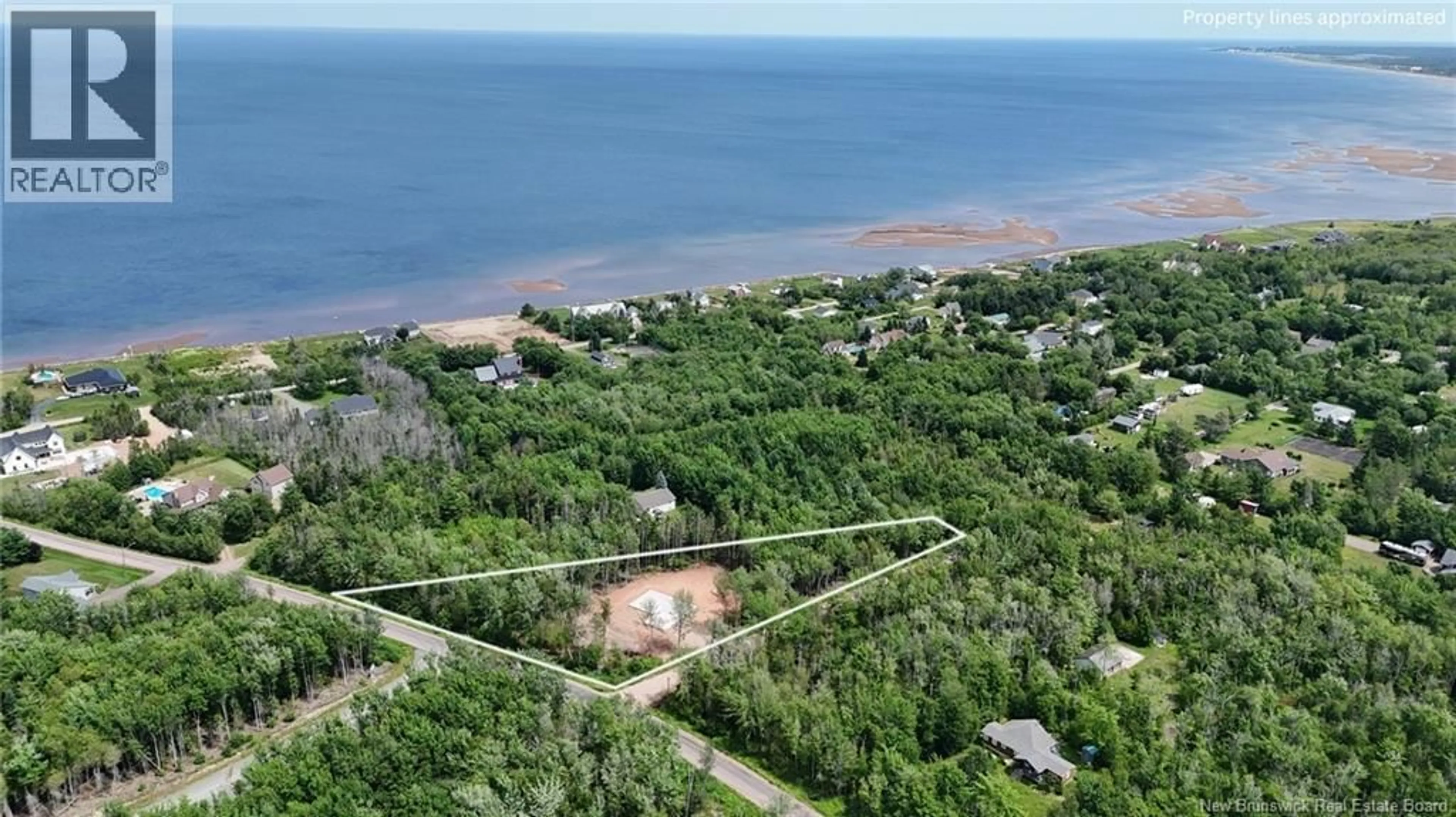 A pic from outside/outdoor area/front of a property/back of a property/a pic from drone, water/lake/river/ocean view for 79 BARON STREET, Barachois New Brunswick E4P8P1