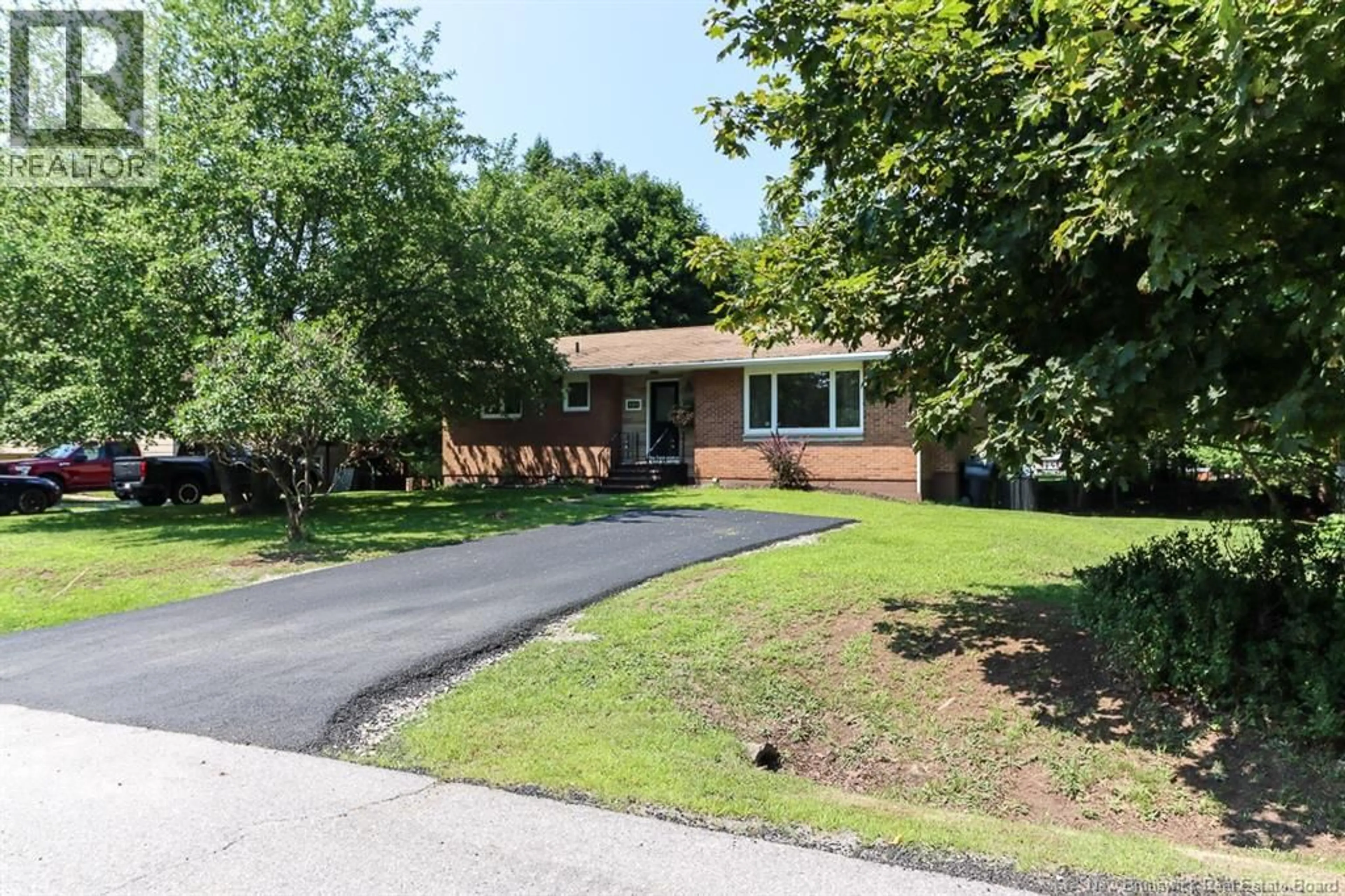 Home with brick exterior material, street for 105 LONGBOW PLACE, Quispamsis New Brunswick E2E1S2