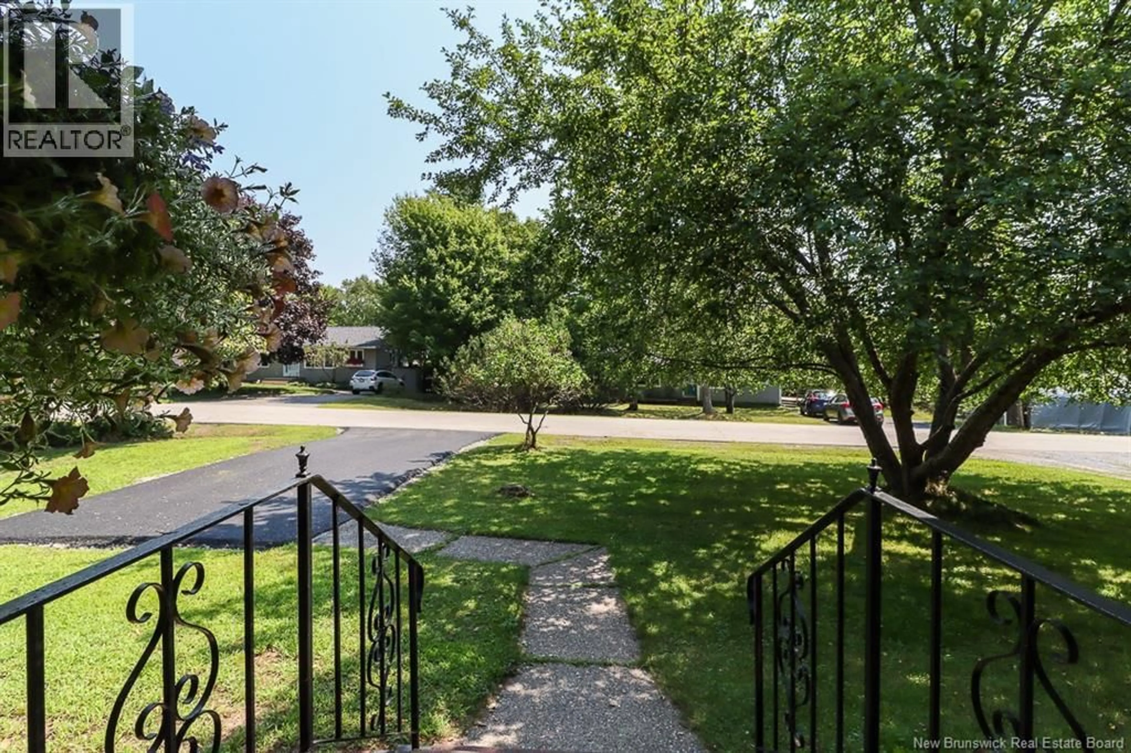 A pic from outside/outdoor area/front of a property/back of a property/a pic from drone, street for 105 LONGBOW PLACE, Quispamsis New Brunswick E2E1S2
