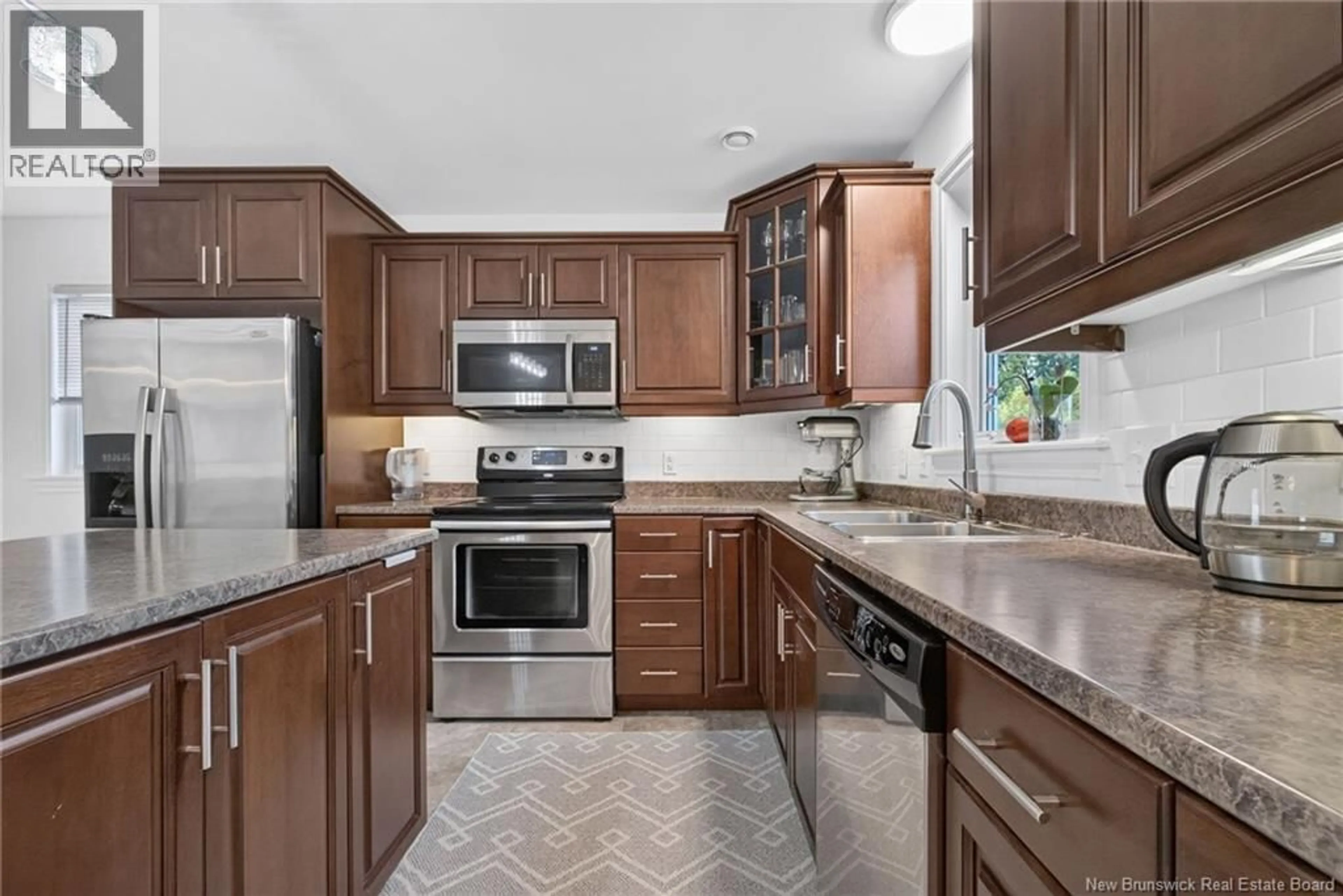 Open concept kitchen, ceramic/tile floor for 137 HOULAHAN STREET, Dieppe New Brunswick E1A4X6