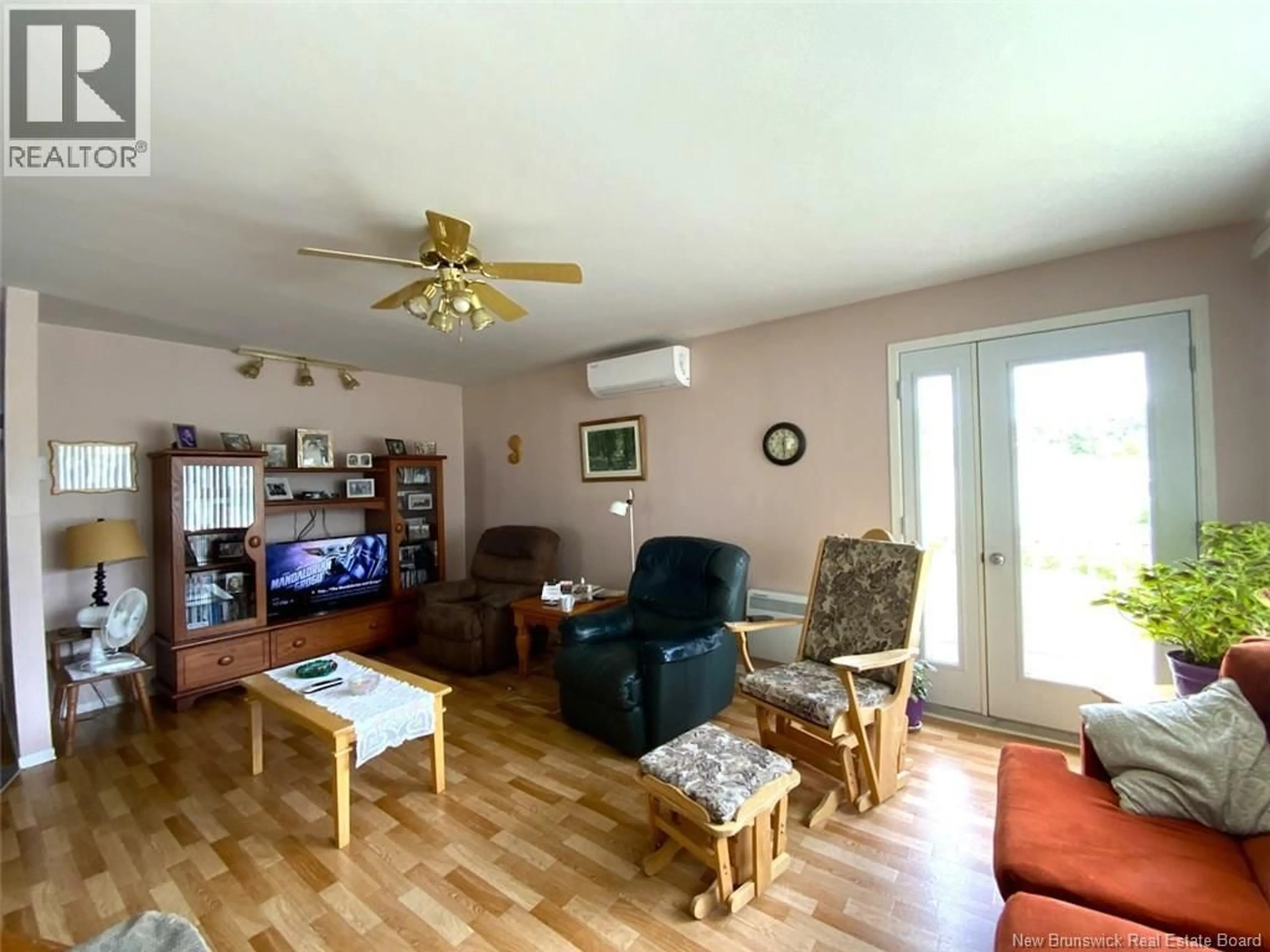 Living room with furniture, wood/laminate floor for 1463 ST-FRANÇOIS STREET, Edmundston New Brunswick E3V3P9