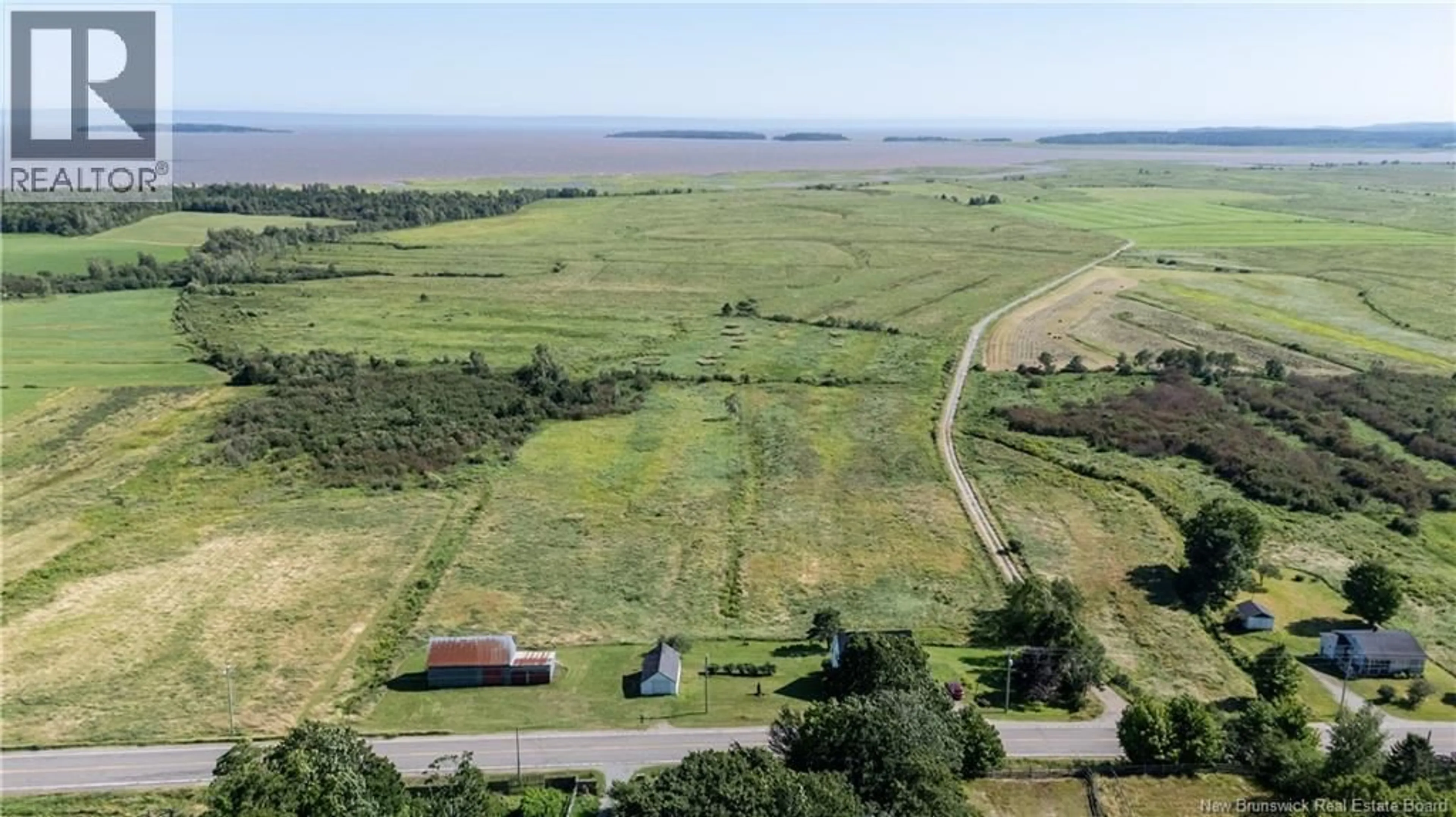 A pic from outside/outdoor area/front of a property/back of a property/a pic from drone, water/lake/river/ocean view for 5133 ROUTE 114, Shepody New Brunswick E4H4K6