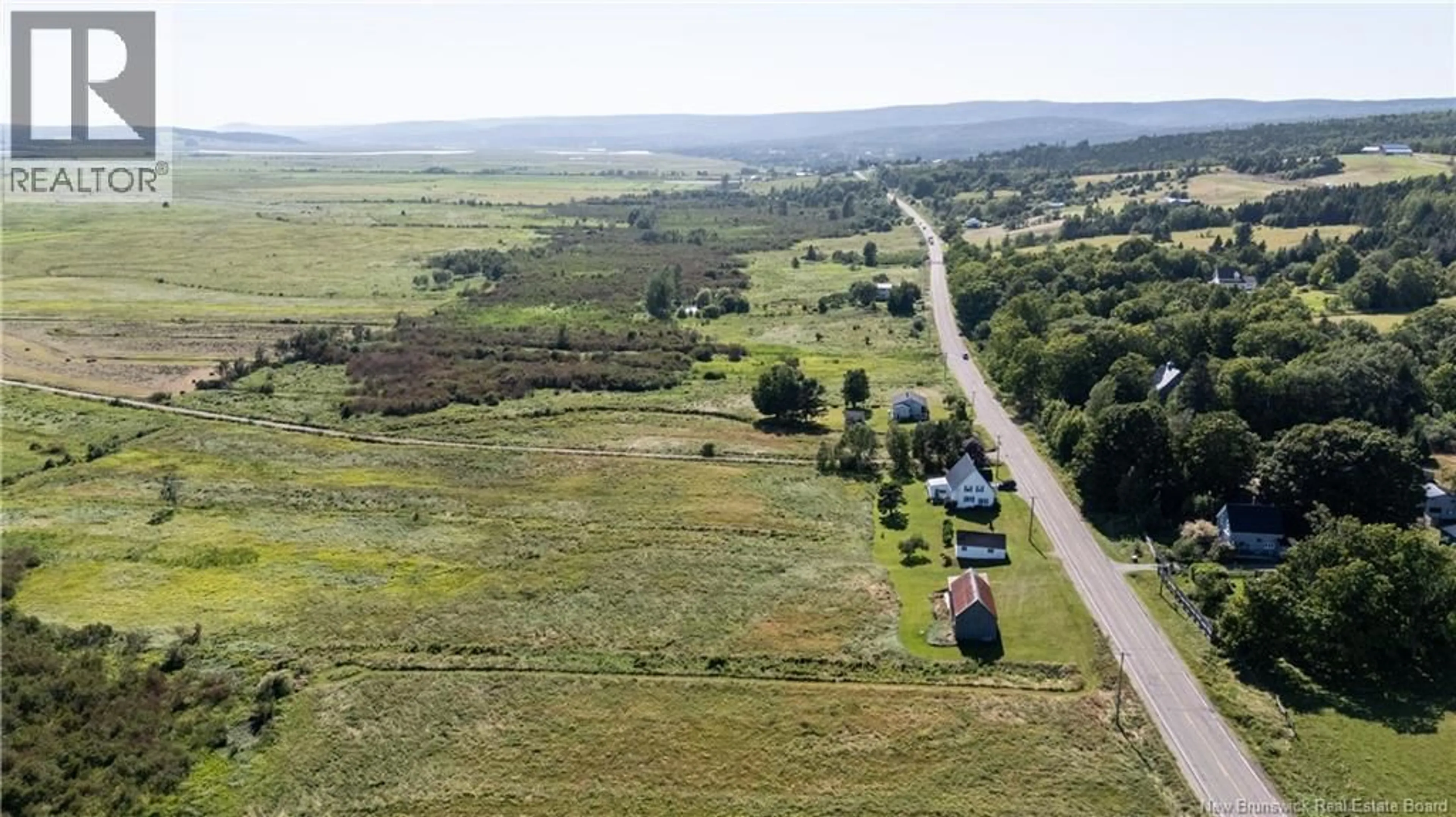 A pic from outside/outdoor area/front of a property/back of a property/a pic from drone, street for 5133 ROUTE 114, Shepody New Brunswick E4H4K6