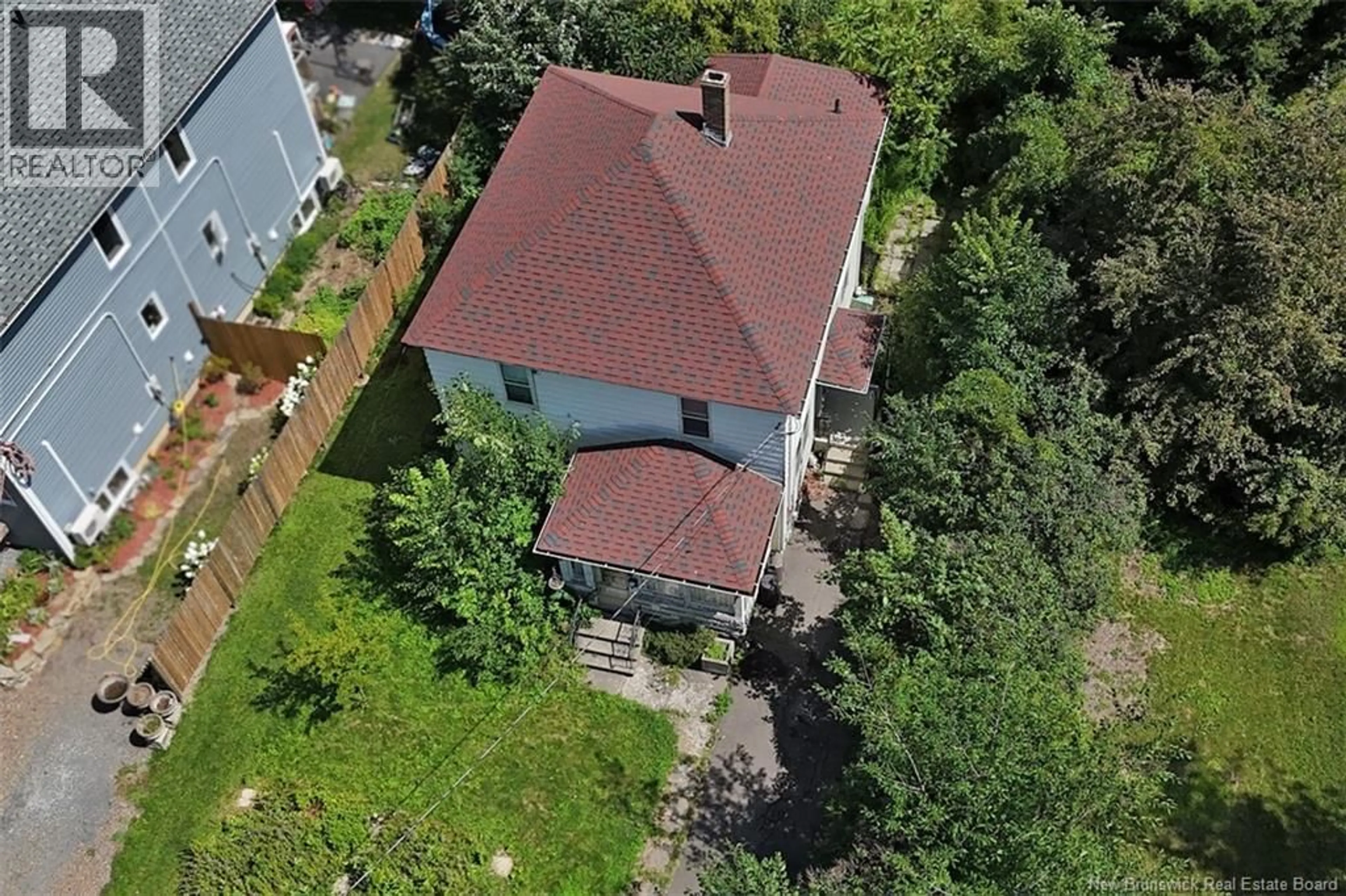 A pic from outside/outdoor area/front of a property/back of a property/a pic from drone, unknown for 865 BARKER STREET, Fredericton New Brunswick E3A3K4