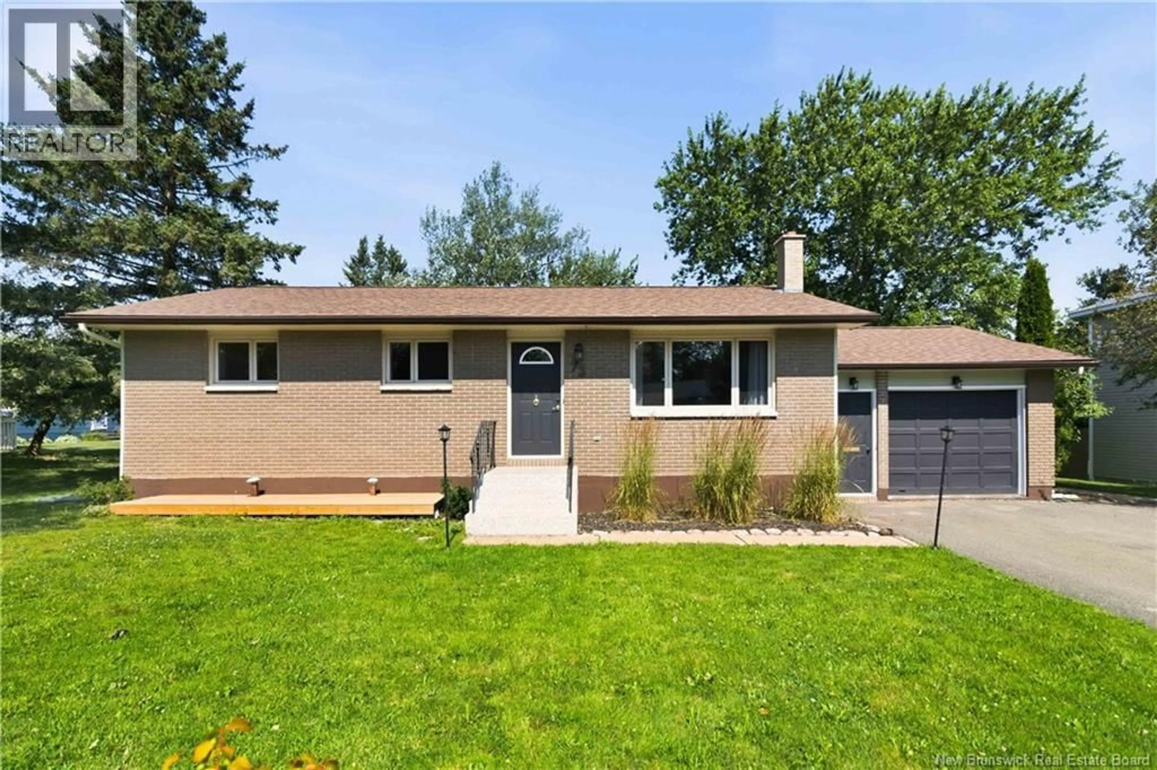 Home with vinyl exterior material, street for 73 LAURELLE AVENUE, Moncton New Brunswick E1G1G2