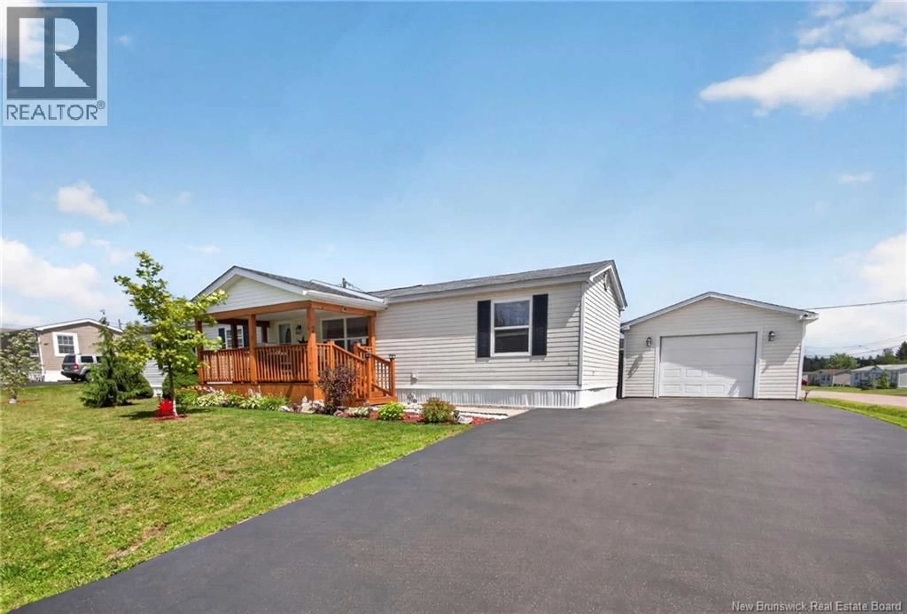Home with vinyl exterior material, street for 2 BUR OAK STREET, Moncton New Brunswick E1H3S1