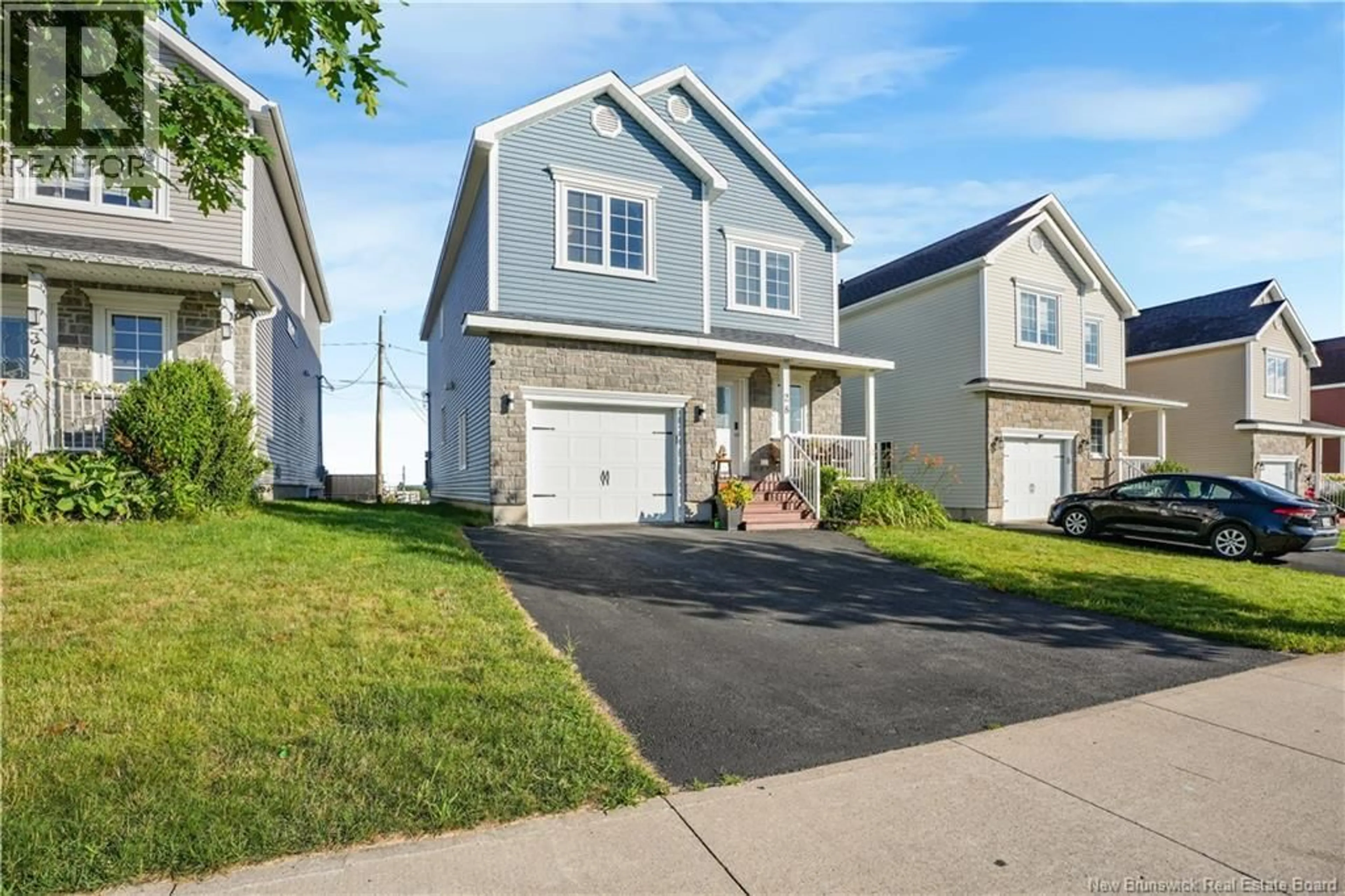 Home with vinyl exterior material, street for 28 LANGILLE DRIVE, Fredericton New Brunswick E3C0L6