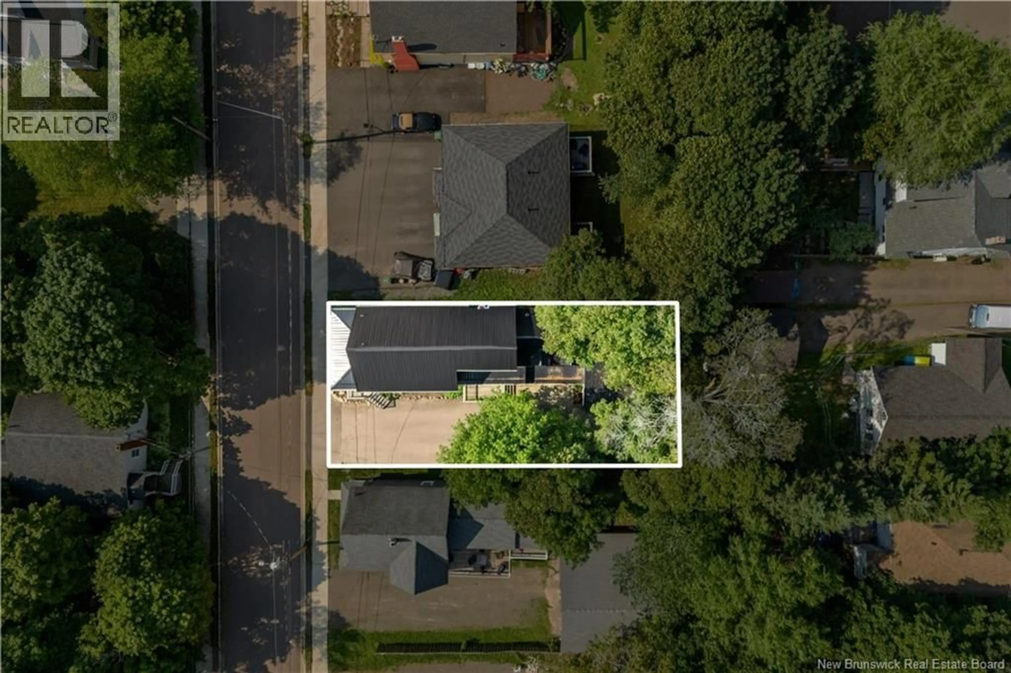 A pic from outside/outdoor area/front of a property/back of a property/a pic from drone, street for 47 PETER STREET, Moncton New Brunswick E1A3W3