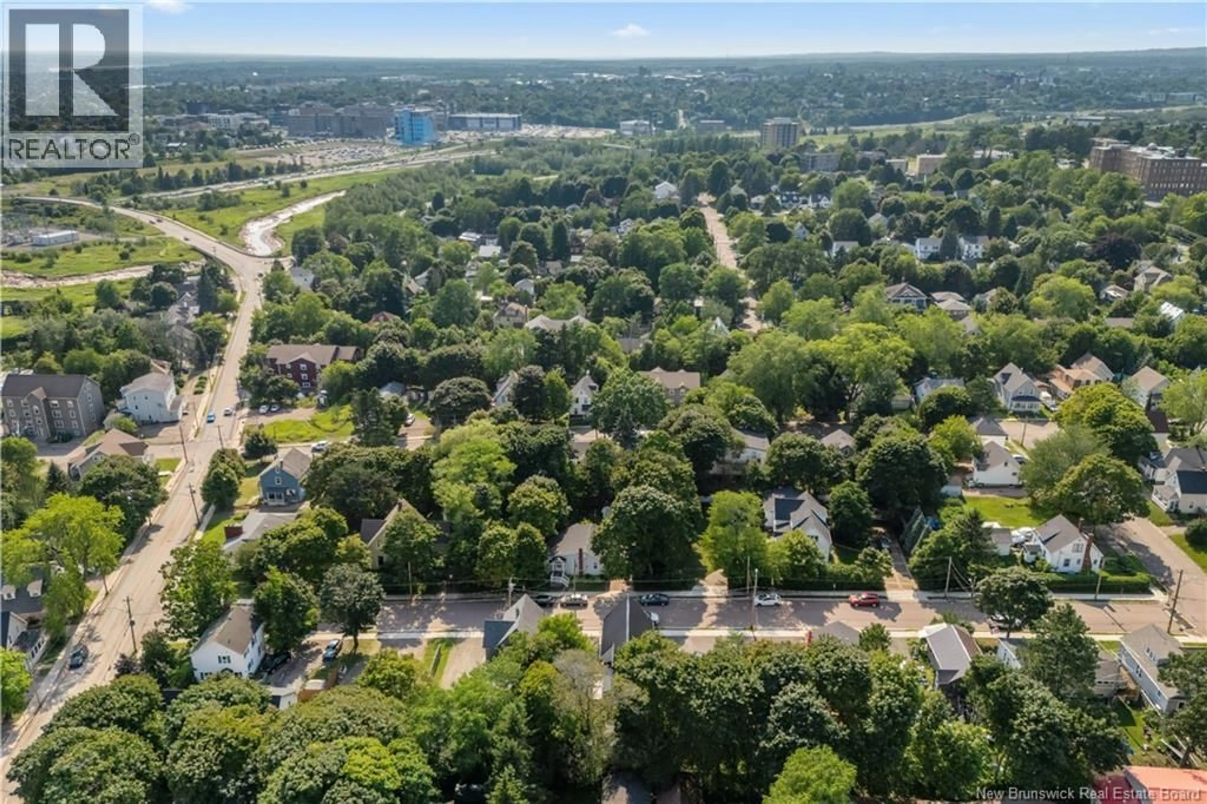 A pic from outside/outdoor area/front of a property/back of a property/a pic from drone, street for 47 PETER STREET, Moncton New Brunswick E1A3W3
