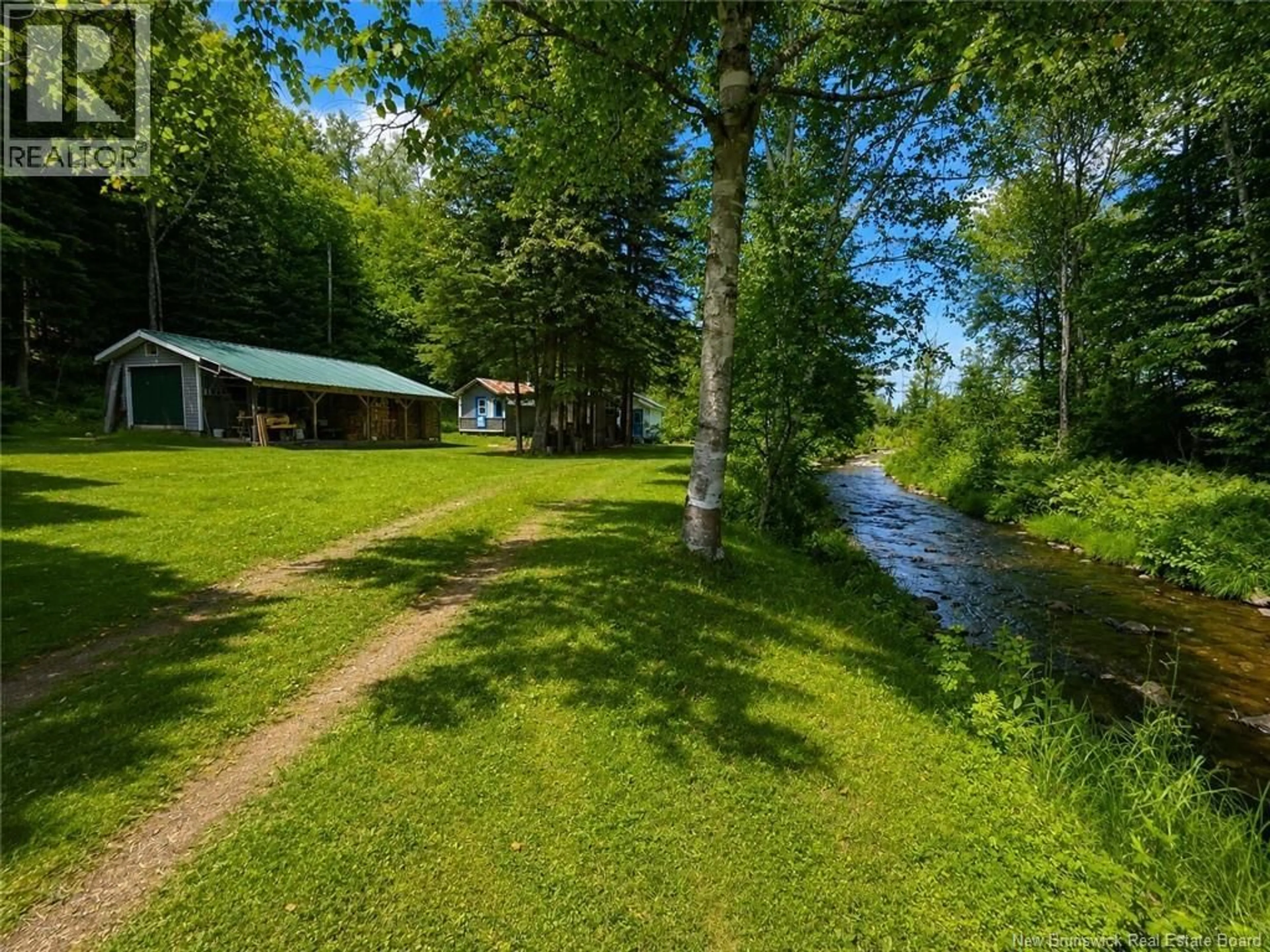 A pic from outside/outdoor area/front of a property/back of a property/a pic from drone, water/lake/river/ocean view for 161 LEONARD COLONY ROAD, Red Rapids New Brunswick E7H2T3