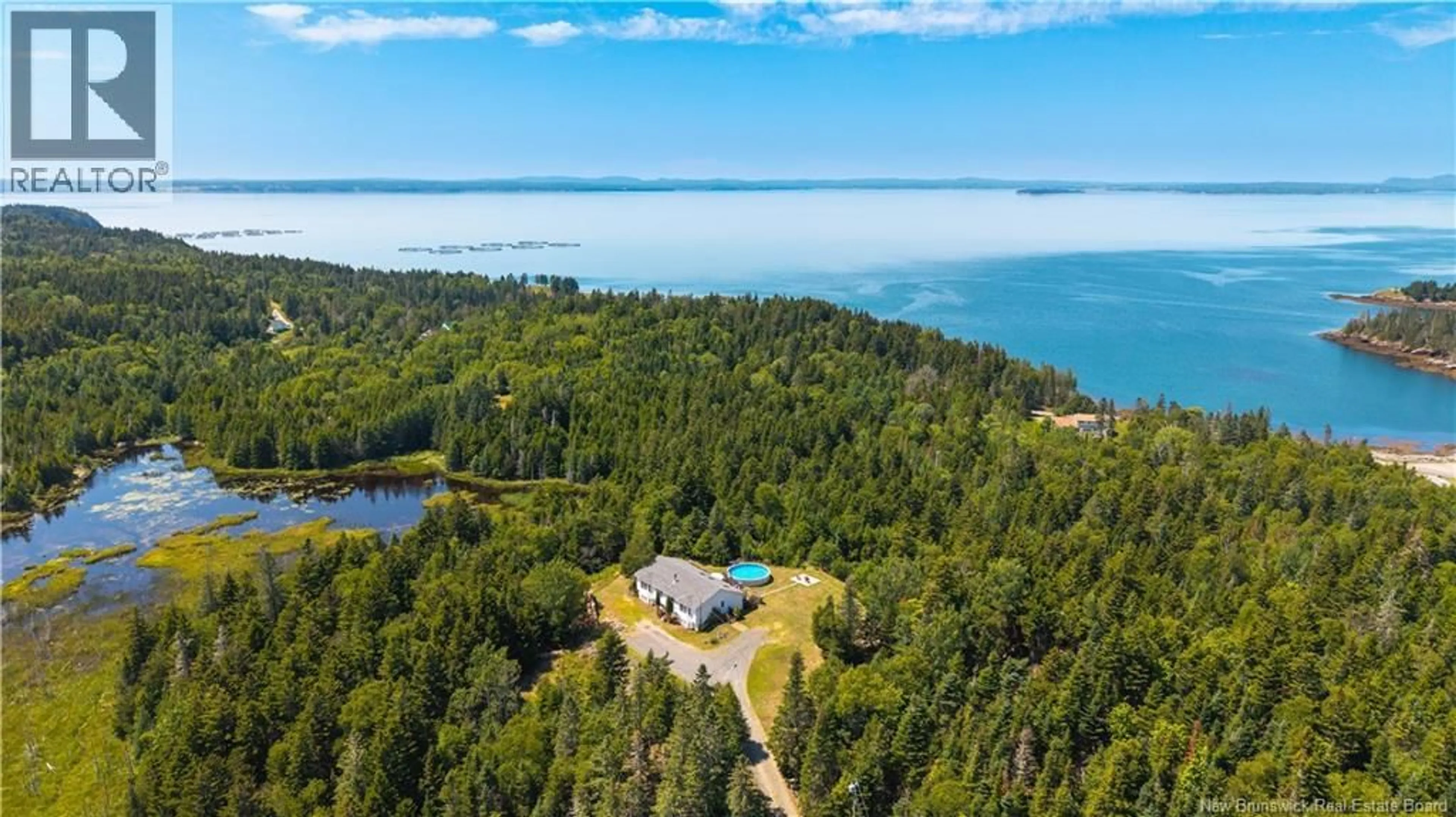 A pic from outside/outdoor area/front of a property/back of a property/a pic from drone, water/lake/river/ocean view for 68 LAMBERT ROAD, Lamberts Cove New Brunswick E5V1C9