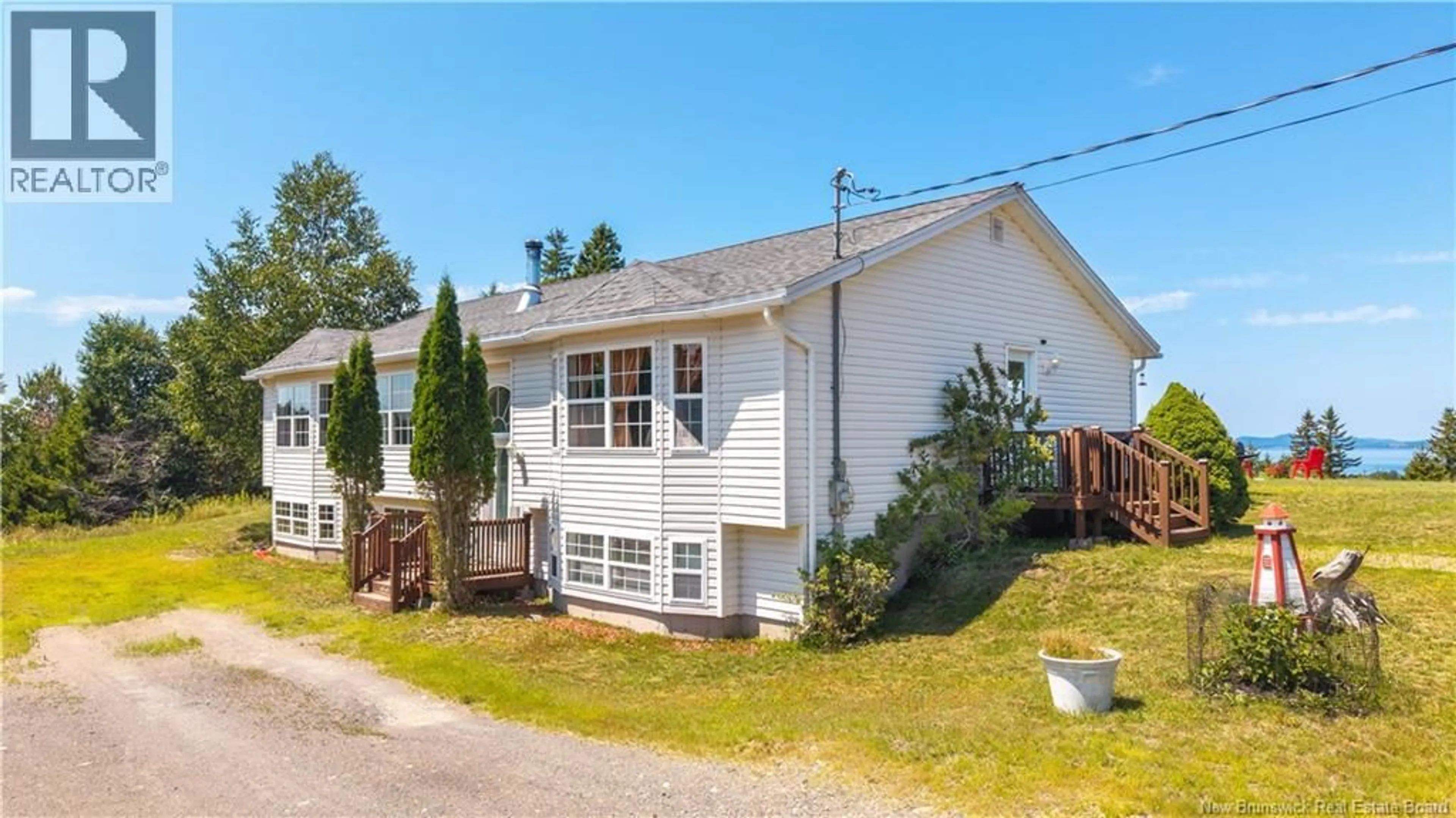 A pic from outside/outdoor area/front of a property/back of a property/a pic from drone, street for 68 LAMBERT ROAD, Lamberts Cove New Brunswick E5V1C9