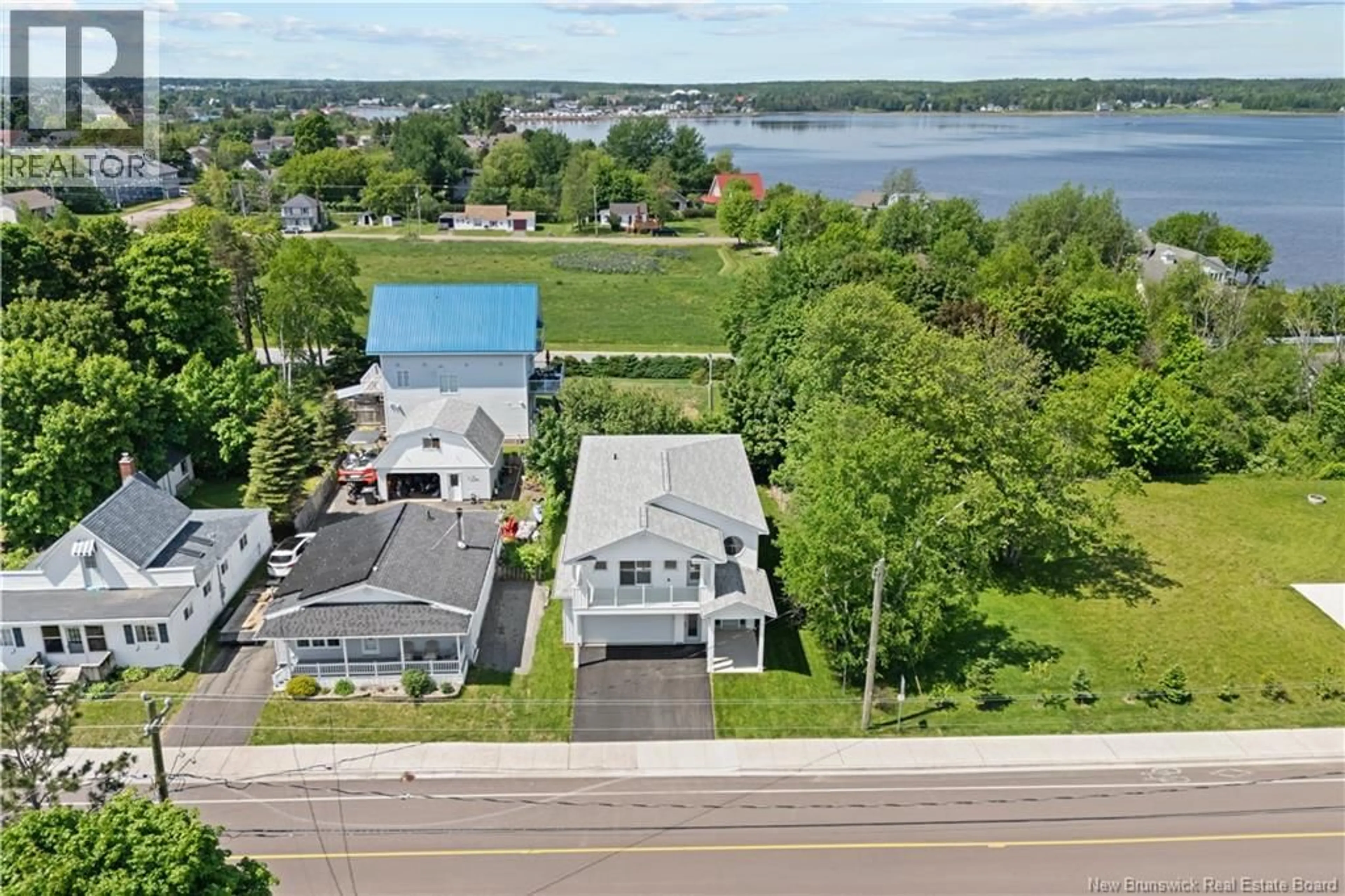 A pic from outside/outdoor area/front of a property/back of a property/a pic from drone, water/lake/river/ocean view for 133 PLEASANT STREET, Shediac New Brunswick E4P2L4