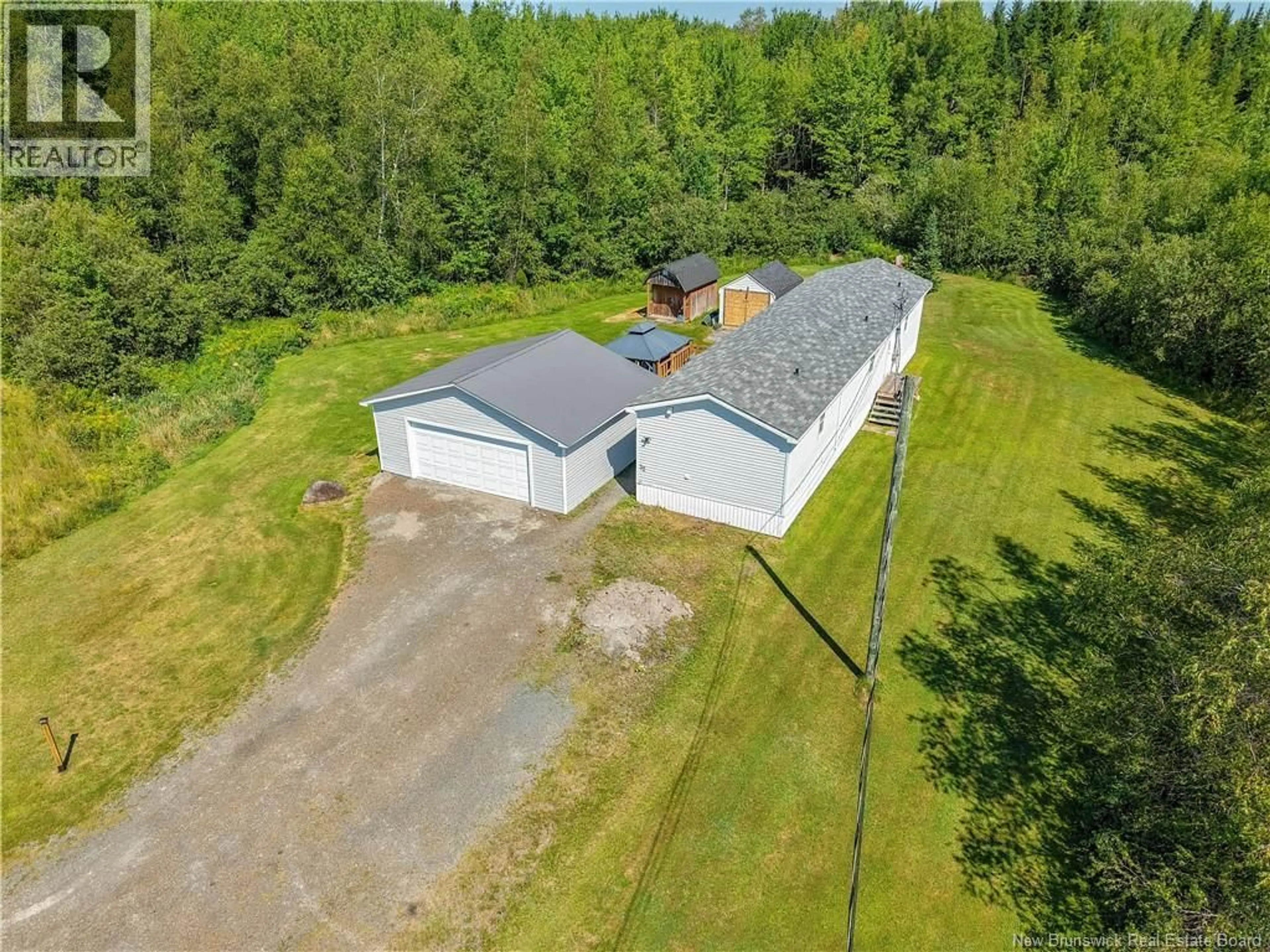 A pic from outside/outdoor area/front of a property/back of a property/a pic from drone, unknown for 32 POPLAR STREET, Waasis New Brunswick E3B9H3