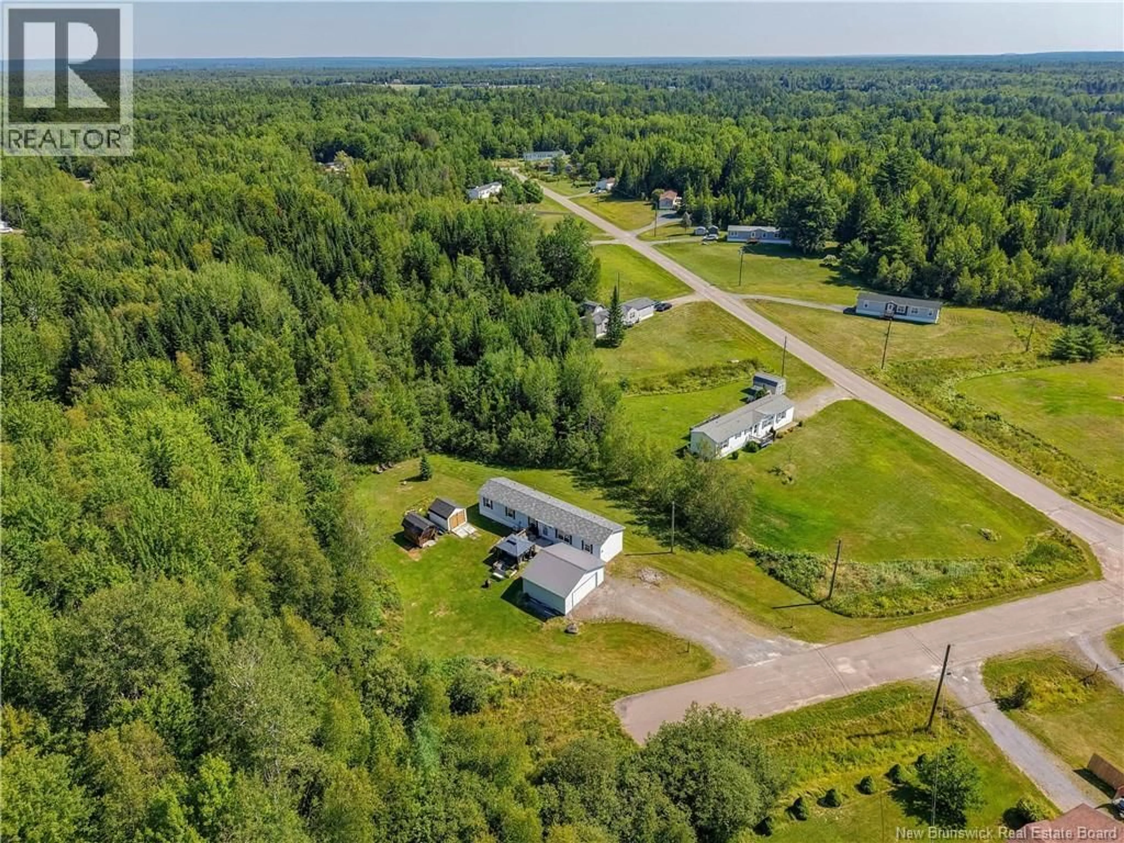A pic from outside/outdoor area/front of a property/back of a property/a pic from drone, unknown for 32 POPLAR STREET, Waasis New Brunswick E3B9H3