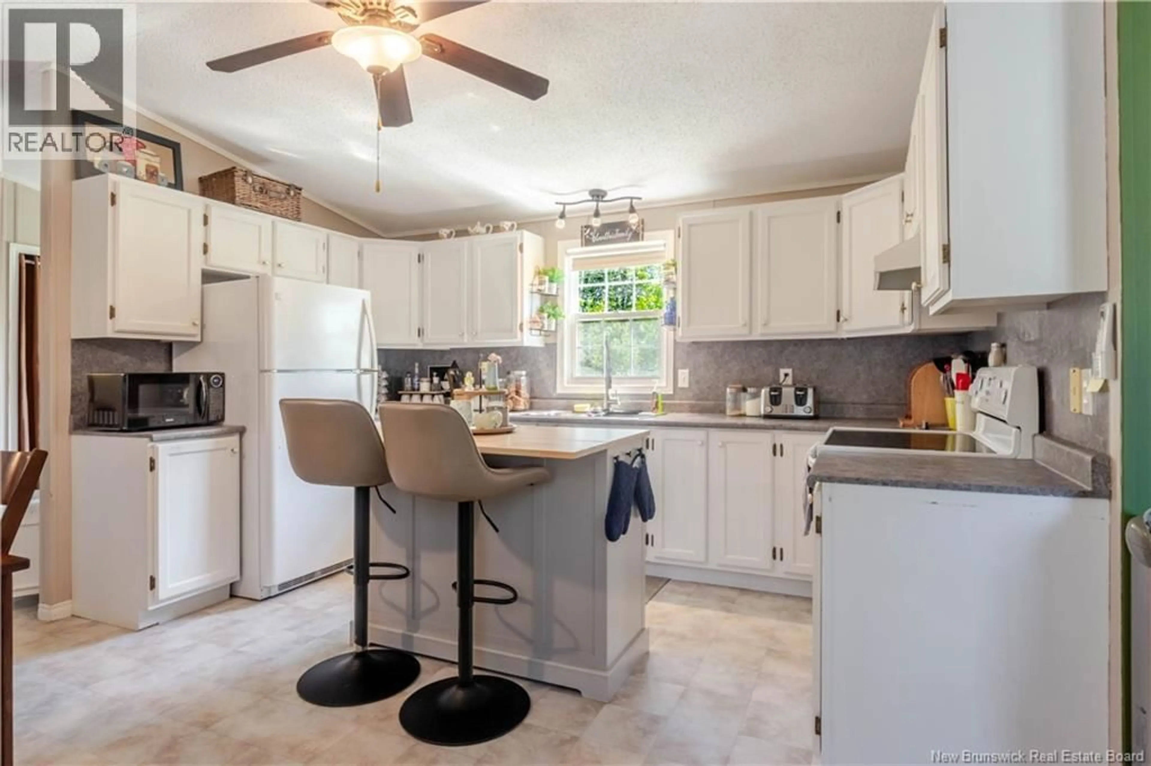 Open concept kitchen, ceramic/tile floor for 32 POPLAR STREET, Waasis New Brunswick E3B9H3