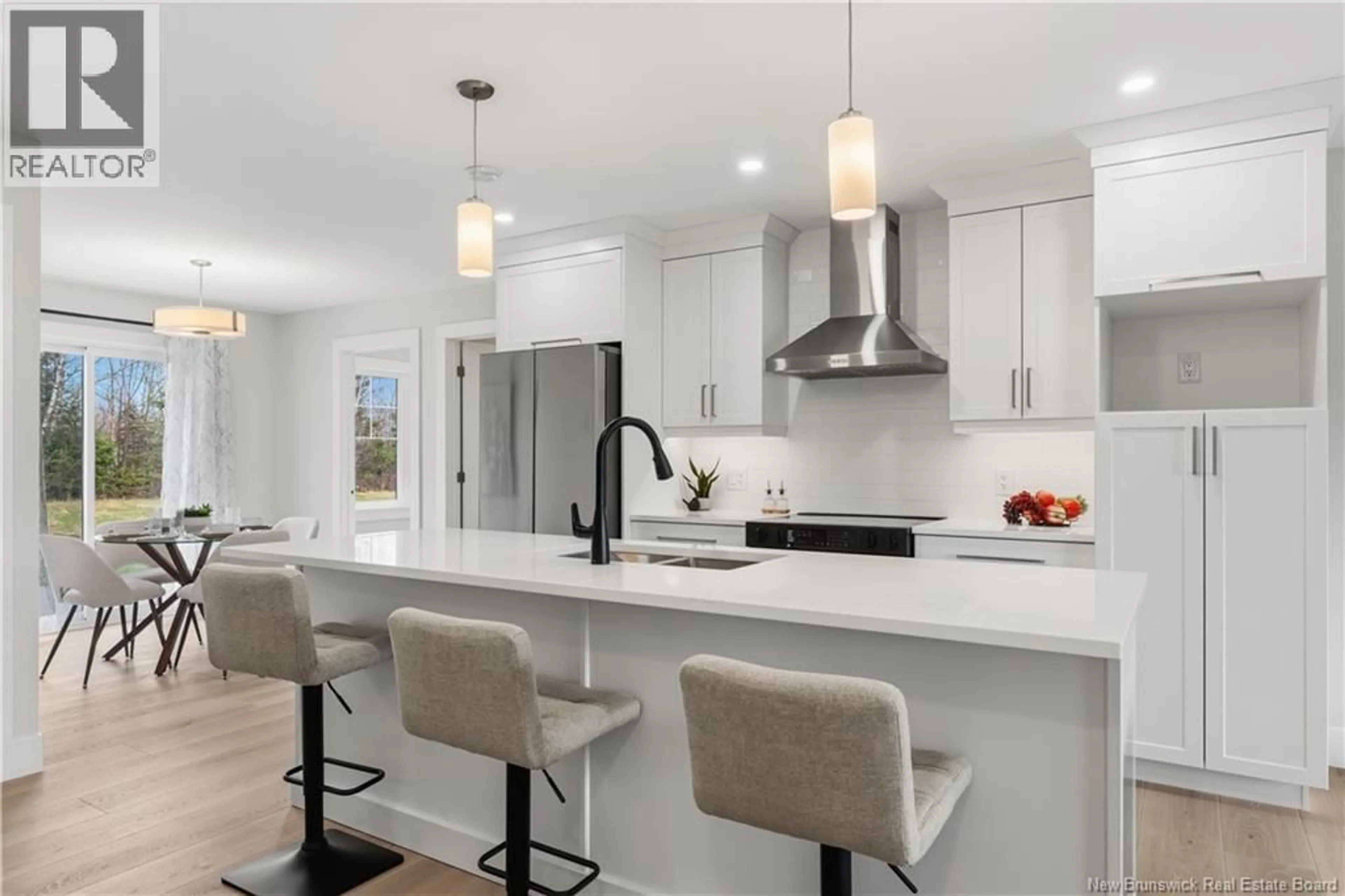 Open concept kitchen, ceramic/tile floor for 17 RUBY STREET, Grand-Barachois New Brunswick E4P9H4
