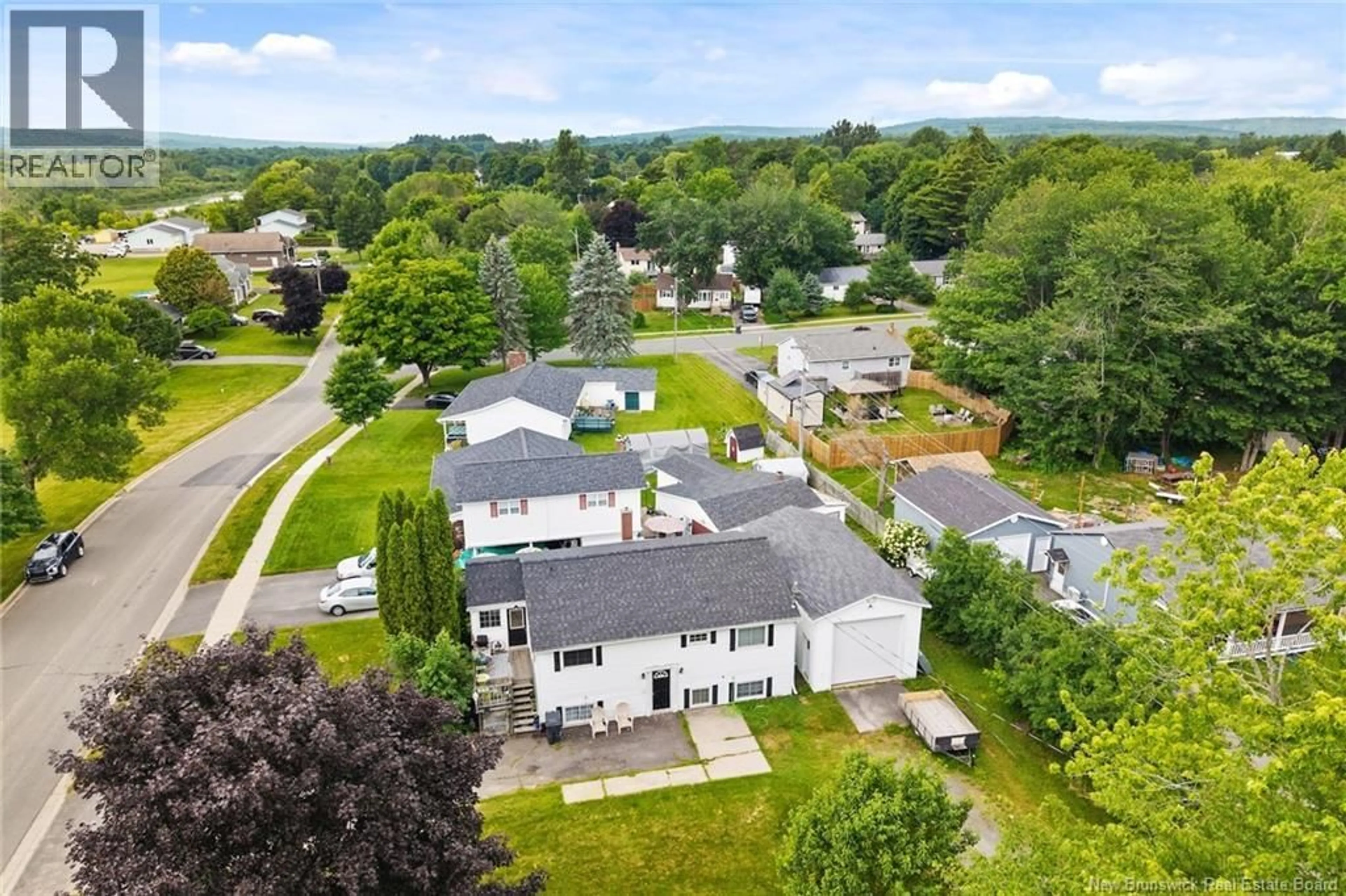 A pic from outside/outdoor area/front of a property/back of a property/a pic from drone, unknown for 93 BURPEE STREET, Fredericton New Brunswick E3A1M2