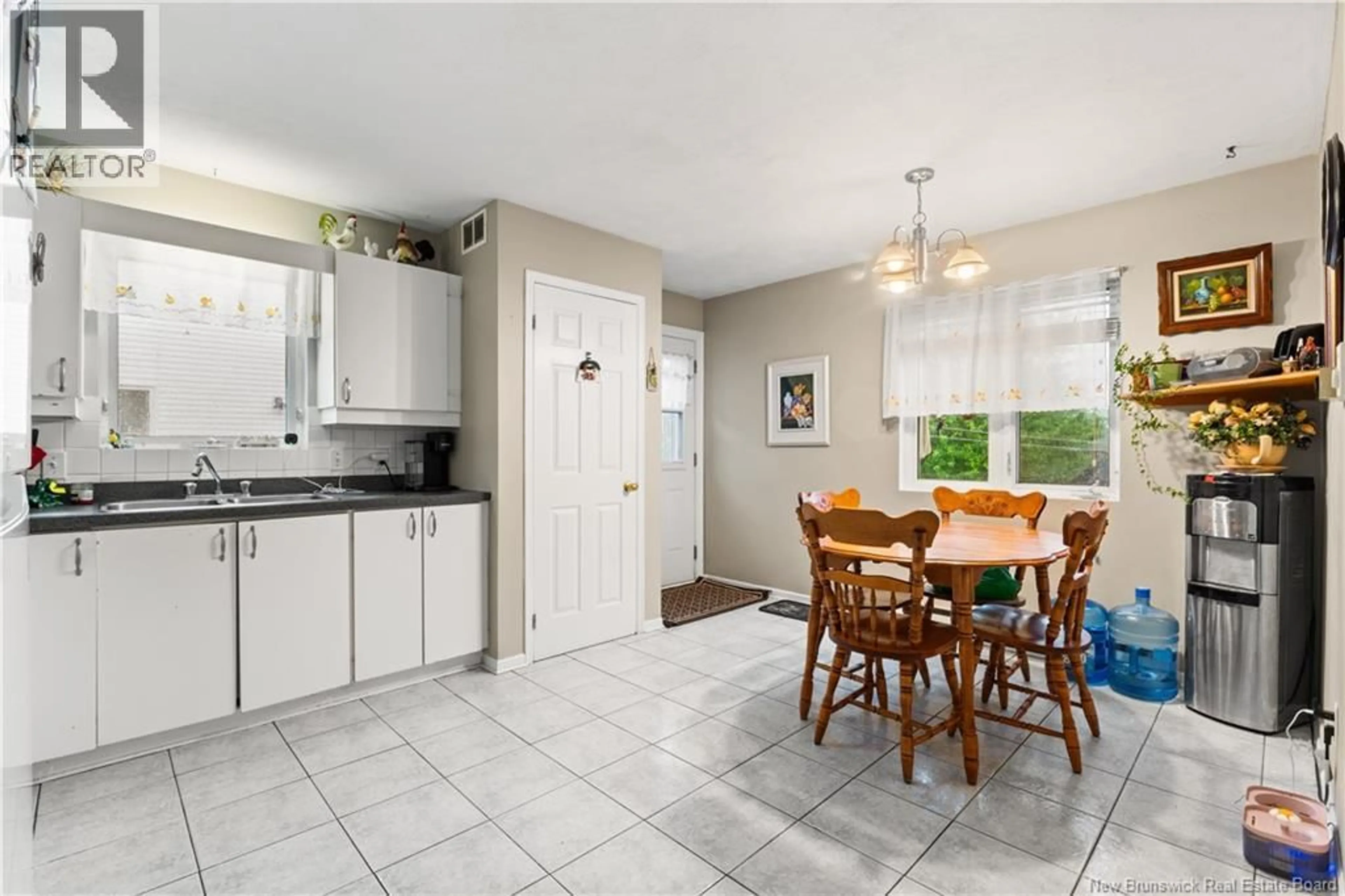 Open concept kitchen, ceramic/tile floor for 101-103 GLENCOE, Moncton New Brunswick E1A6P6