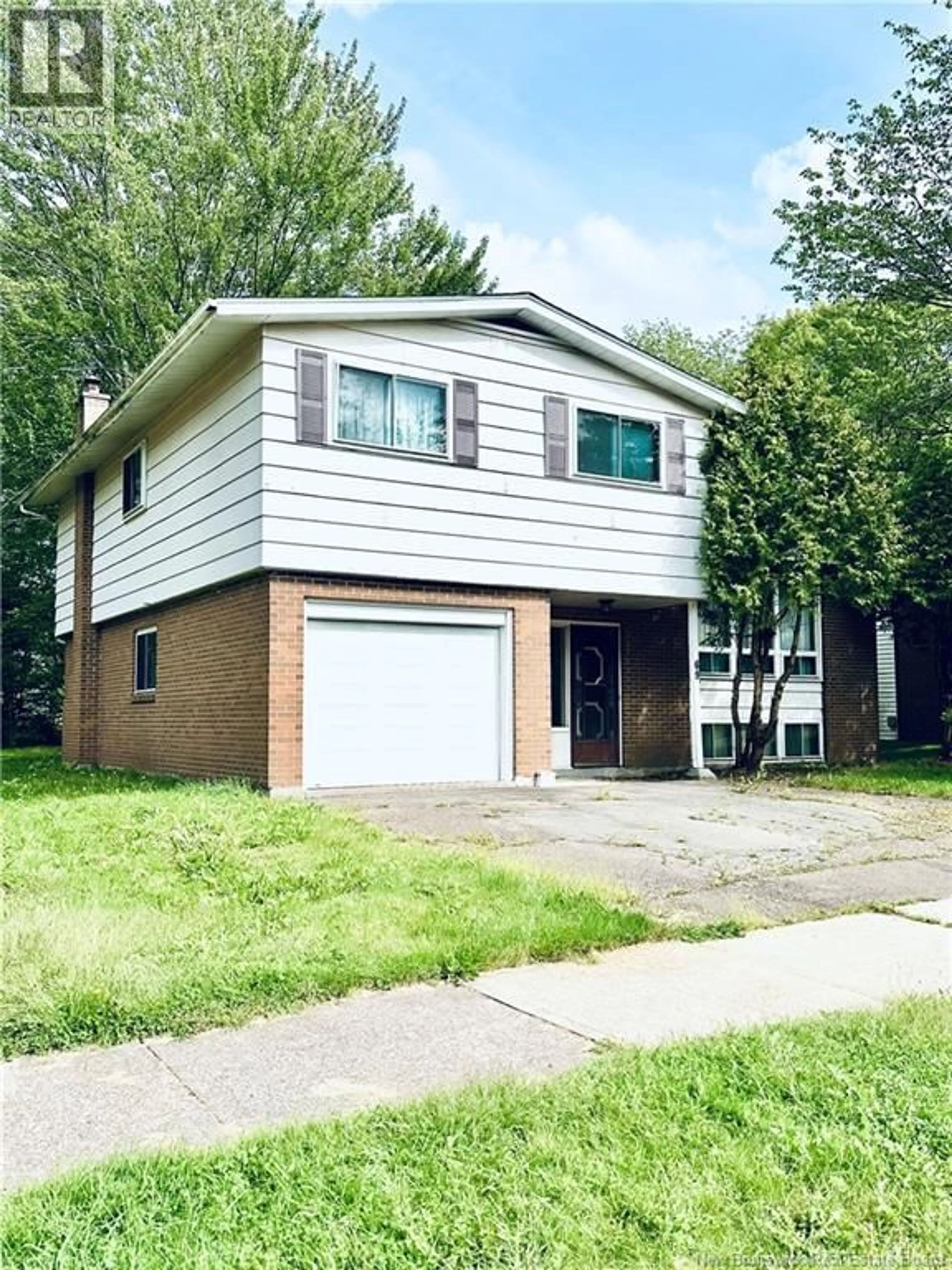 Home with brick exterior material, street for 69 CHANDLER CRESCENT, Moncton New Brunswick E1E3W6