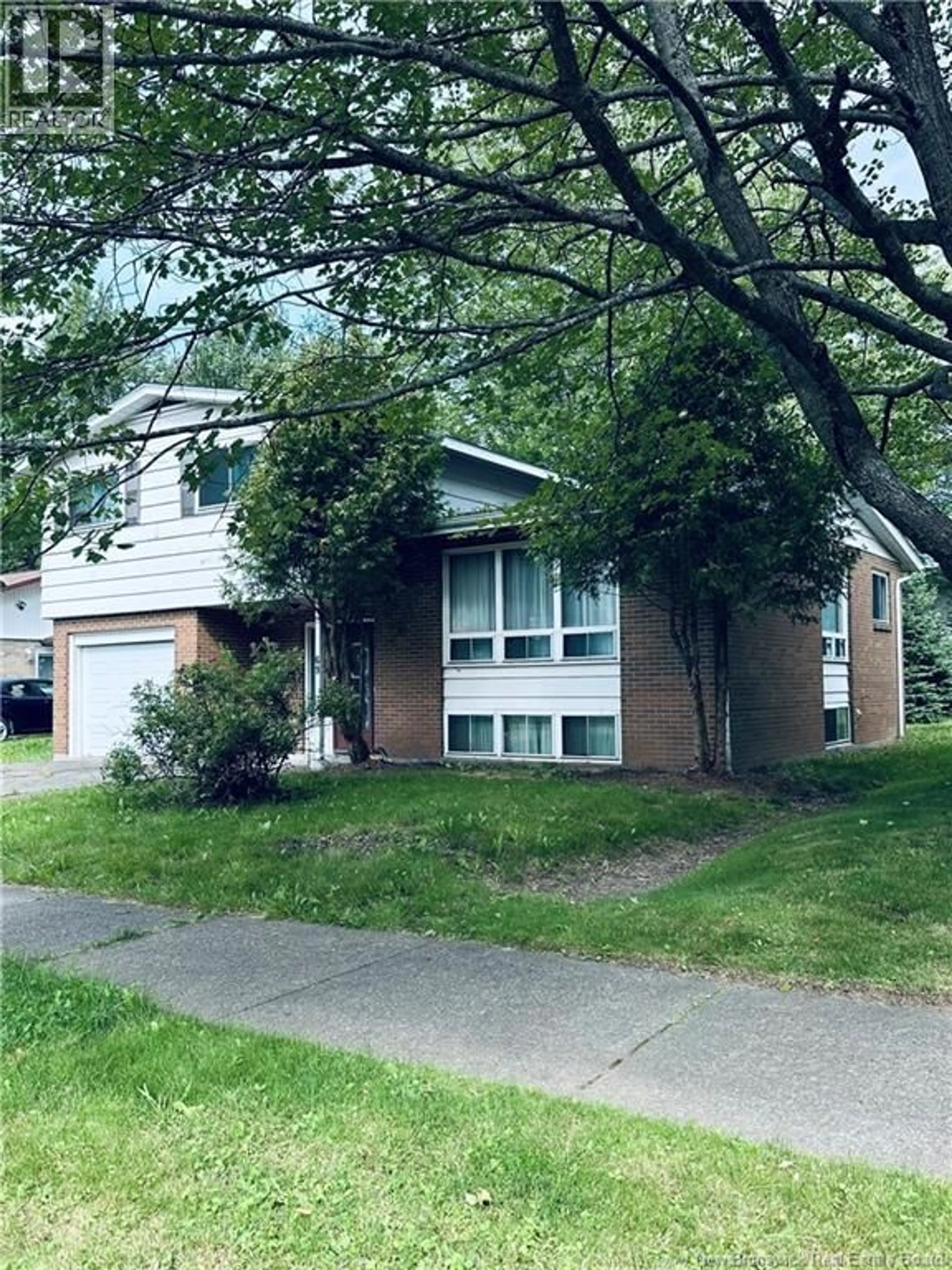 Home with brick exterior material, street for 69 CHANDLER CRESCENT, Moncton New Brunswick E1E3W6