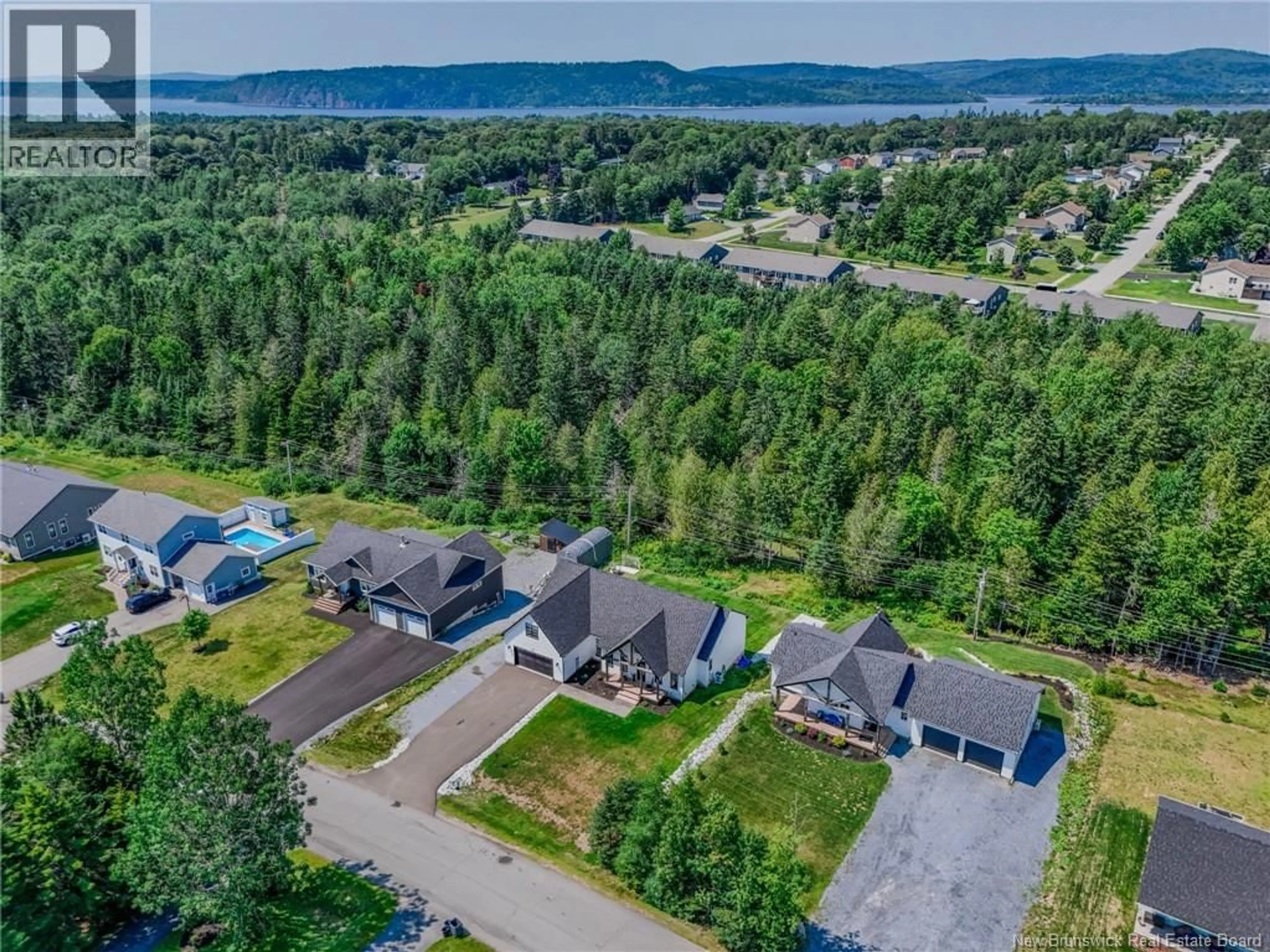 A pic from outside/outdoor area/front of a property/back of a property/a pic from drone, unknown for 72 LONGWOOD DRIVE, Rothesay New Brunswick E2E0C2