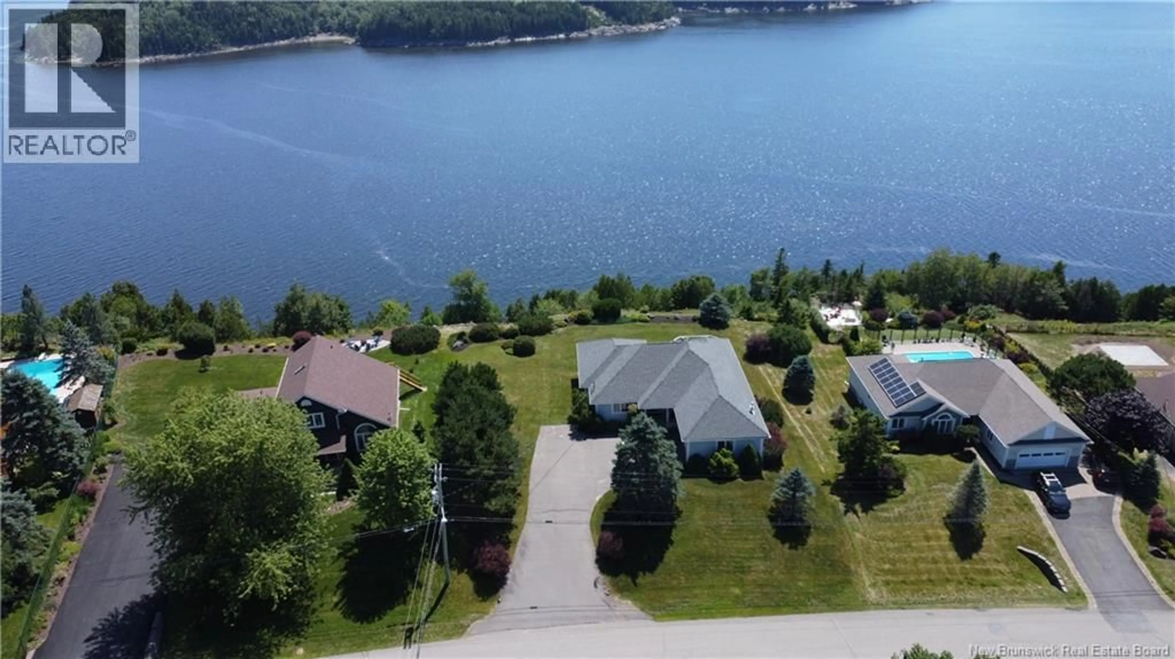 A pic from outside/outdoor area/front of a property/back of a property/a pic from drone, water/lake/river/ocean view for 91 RIVERSHORE DRIVE, Saint John New Brunswick E2K4X4