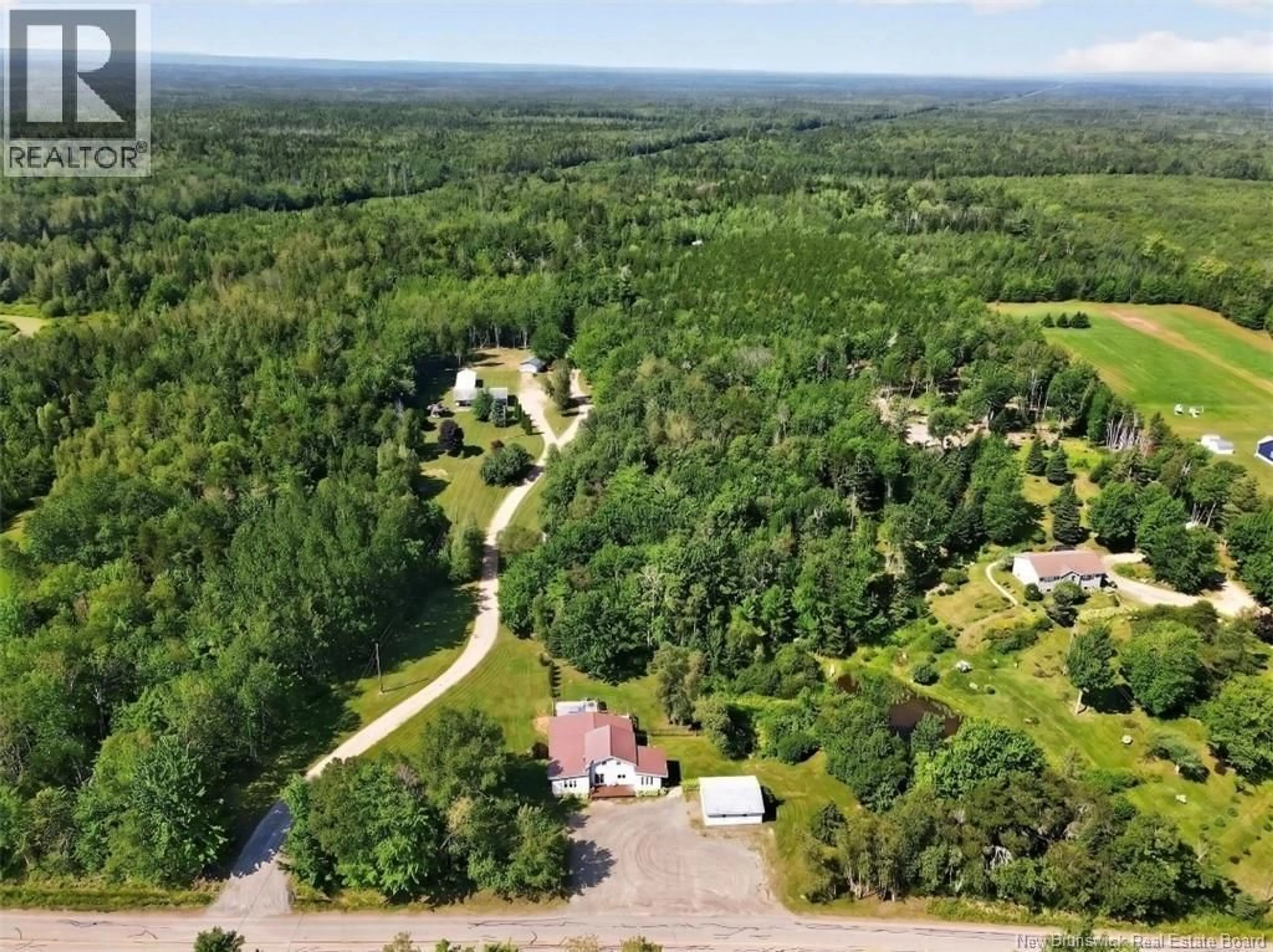 A pic from outside/outdoor area/front of a property/back of a property/a pic from drone, forest/trees view for 1135 PINE GLEN, Pine Glen New Brunswick E1J1R3