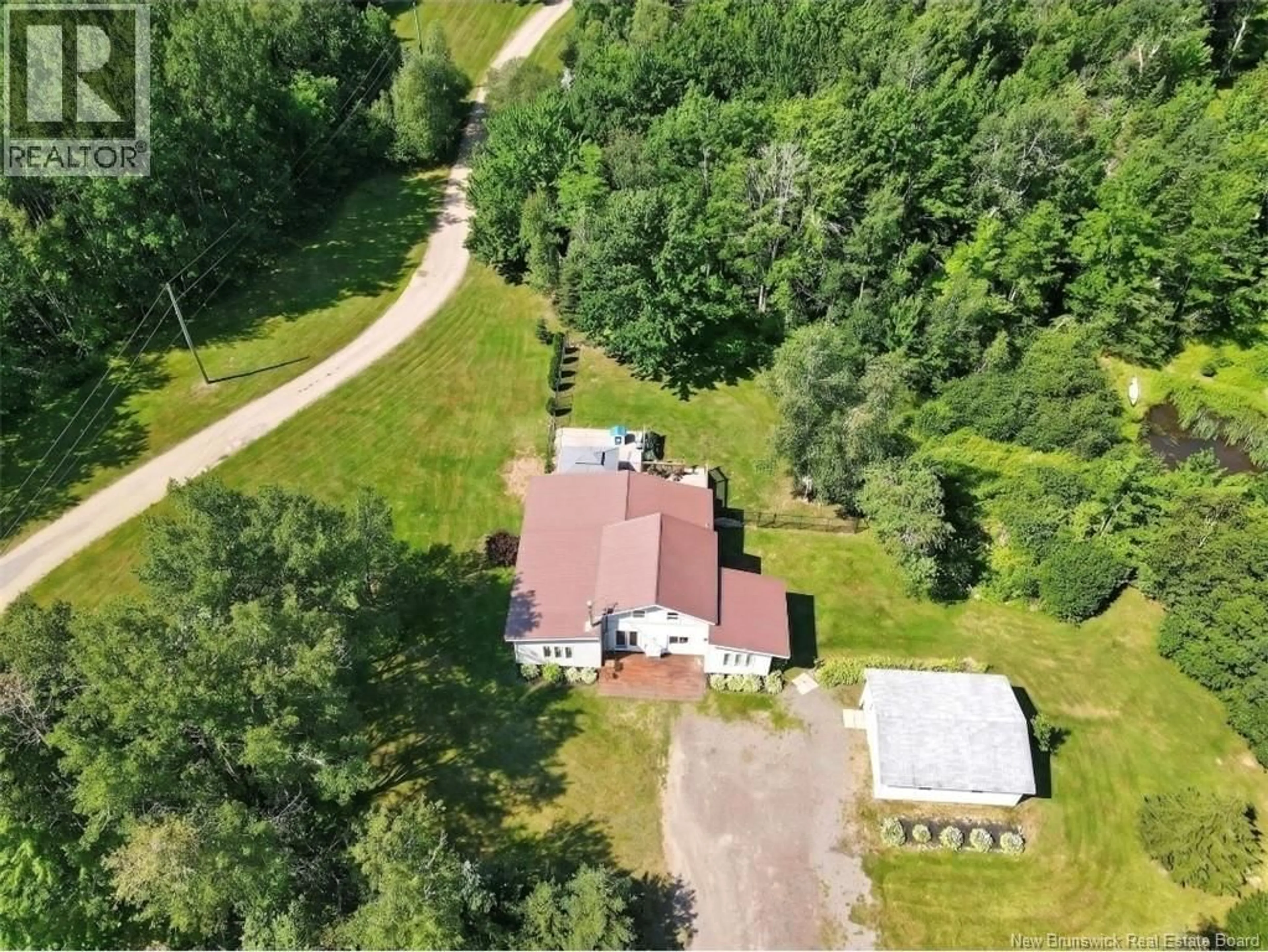 A pic from outside/outdoor area/front of a property/back of a property/a pic from drone, unknown for 1135 PINE GLEN, Pine Glen New Brunswick E1J1R3
