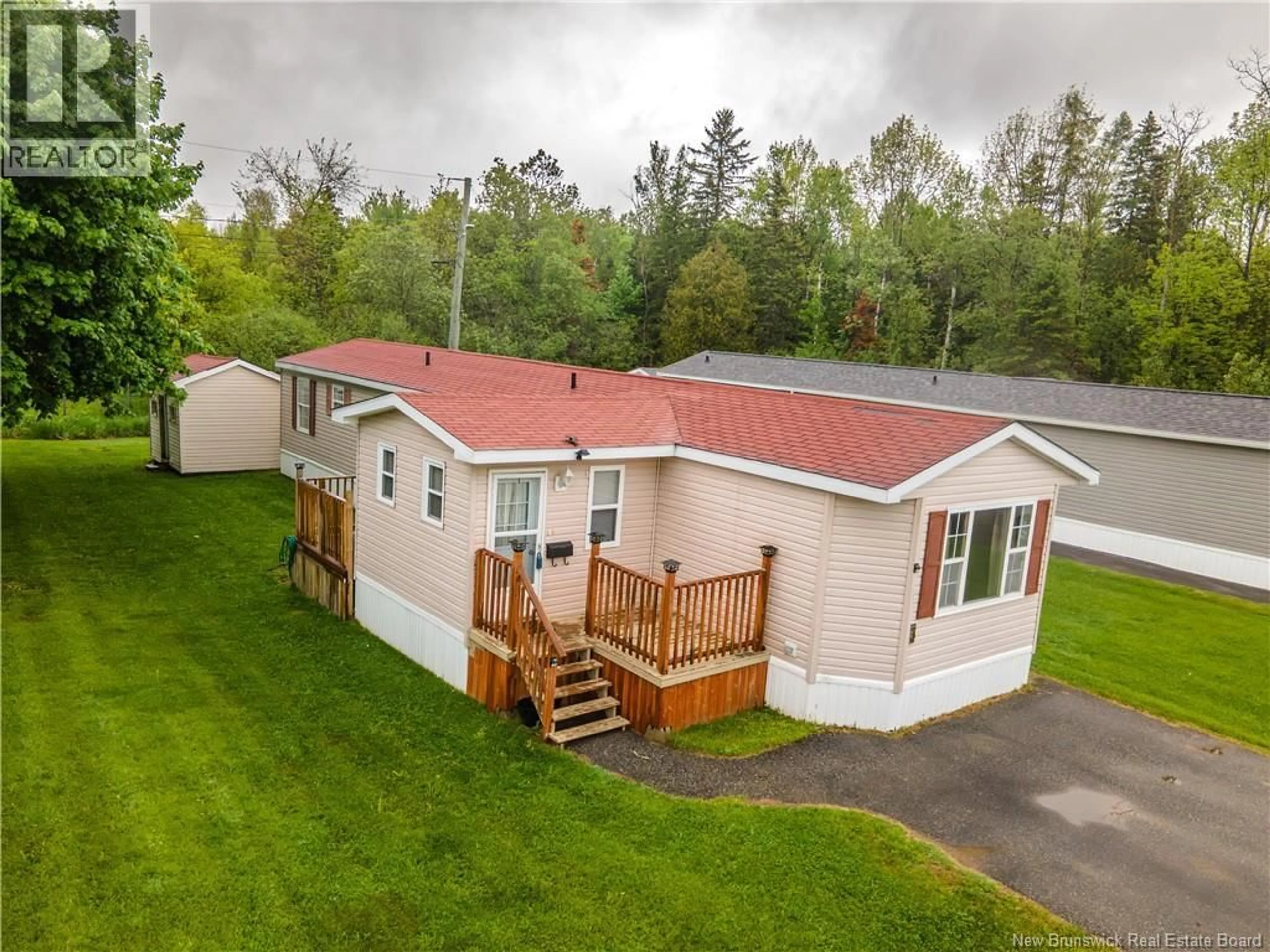 A pic from outside/outdoor area/front of a property/back of a property/a pic from drone, unknown for 3 FIFTH STREET, Sussex Corner New Brunswick E4E5Z3