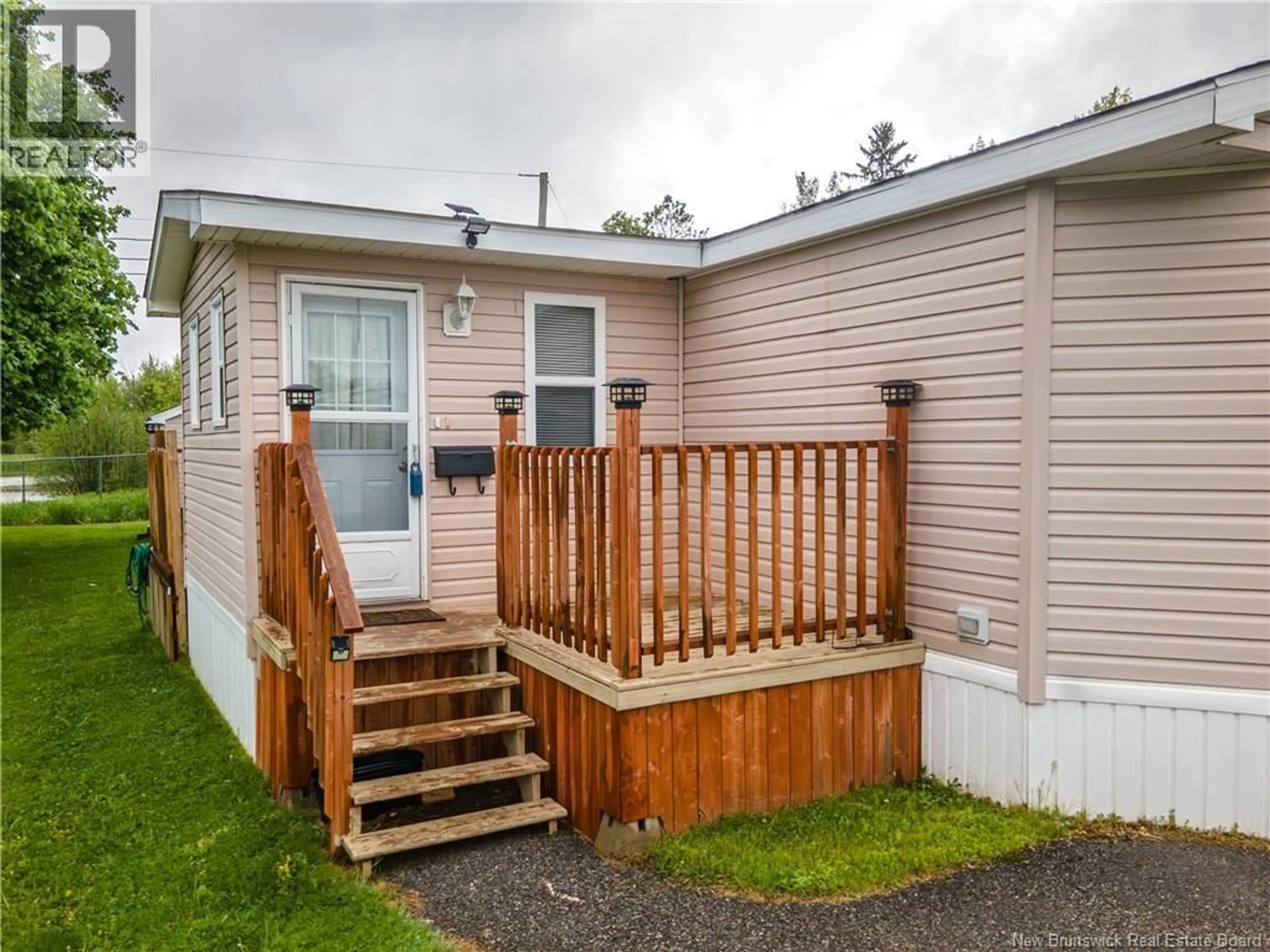 Home with vinyl exterior material, street for 3 FIFTH STREET, Sussex Corner New Brunswick E4E5Z3
