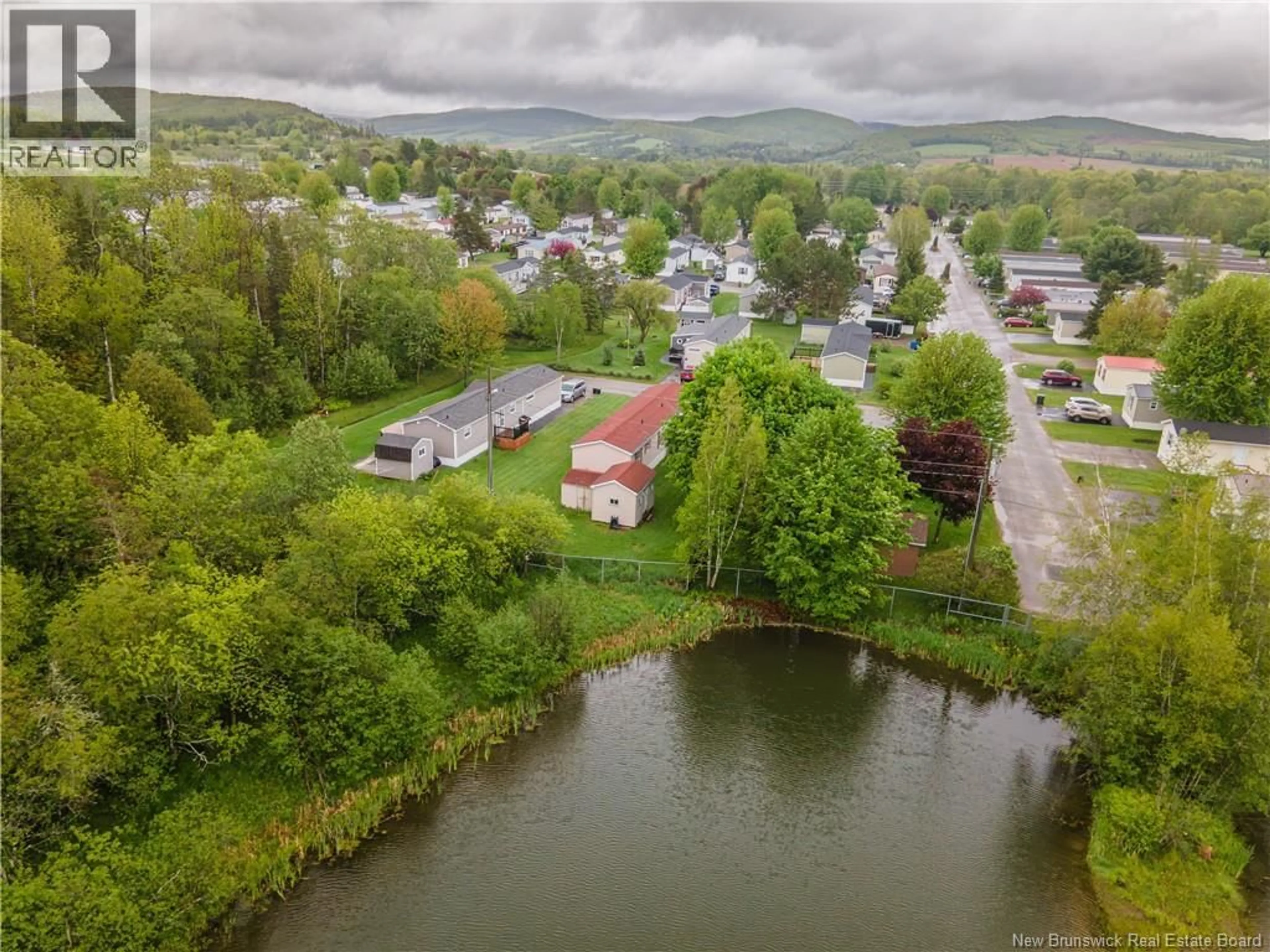 A pic from outside/outdoor area/front of a property/back of a property/a pic from drone, water/lake/river/ocean view for 3 FIFTH STREET, Sussex Corner New Brunswick E4E5Z3